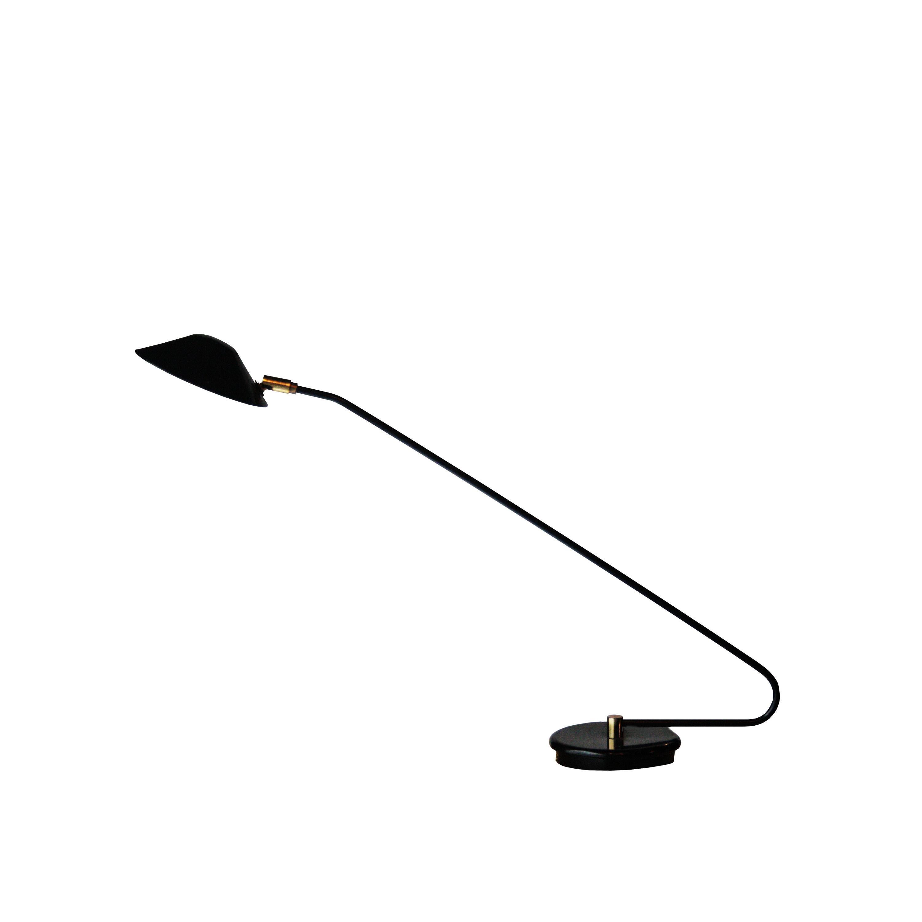 Italian desk lamp with structure and metal base lacquered in black with brass details.