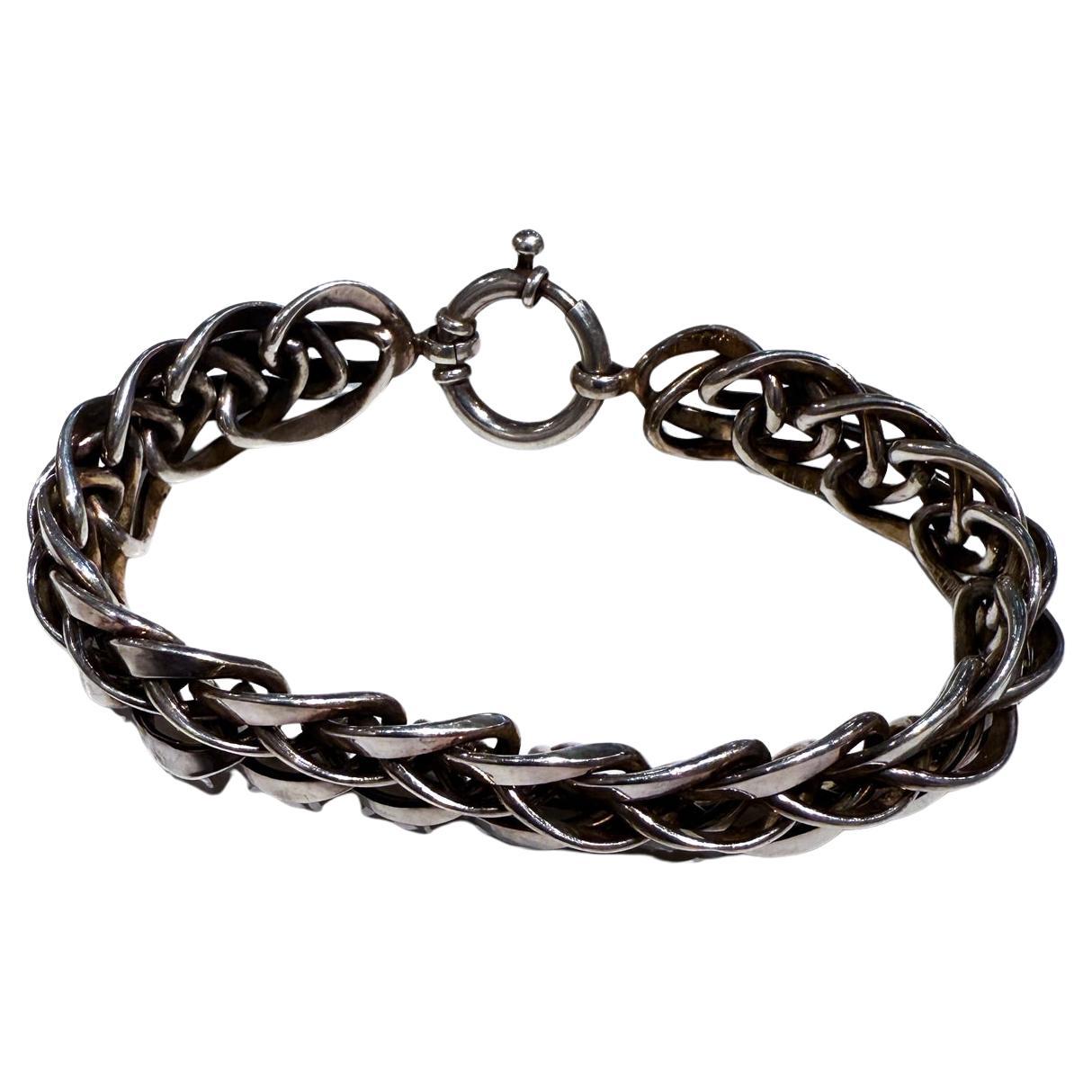 Bracciale vintage A Link in argento intrecciato
7,88 di lunghezza x .63 di larghezza
Usato d'epoca
Fai riferimento alle immagini elencate