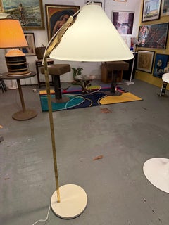 Midcentury Modern Brass Floor Lamp with Plastic Shade in the style of Nikoll
