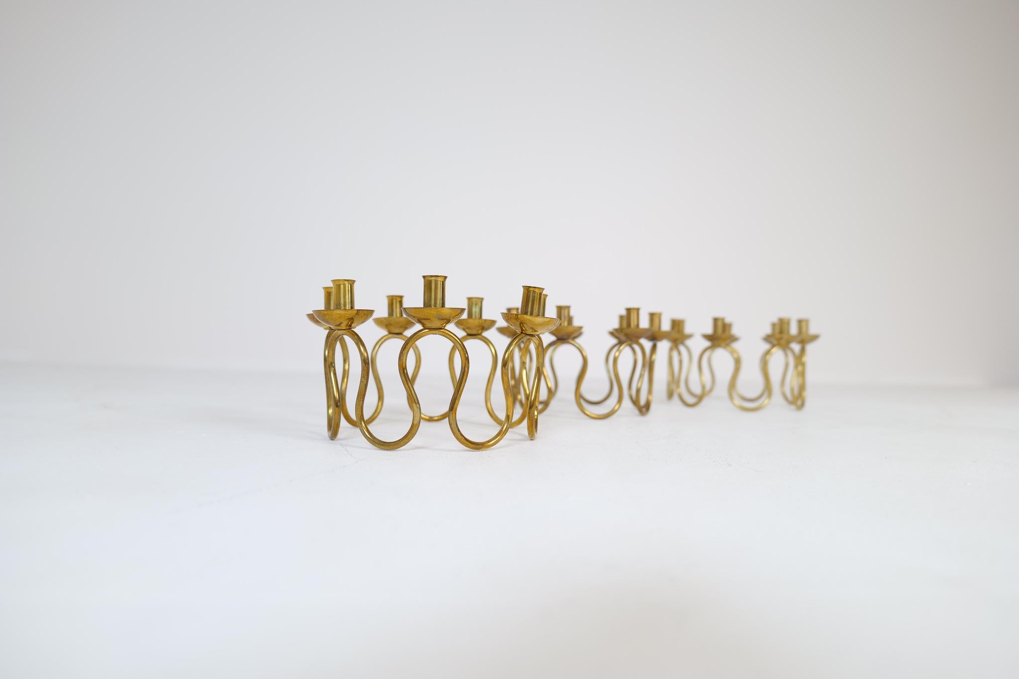 Midcentury brass candlestick designed by Lars Holmström. Produced by Lars Holmström in Arvika, Sweden.
Wonderfully handcrafted brass candlestick with that modern look. These three pieces was produced by Holmström and sold at Svensk Tenn location in