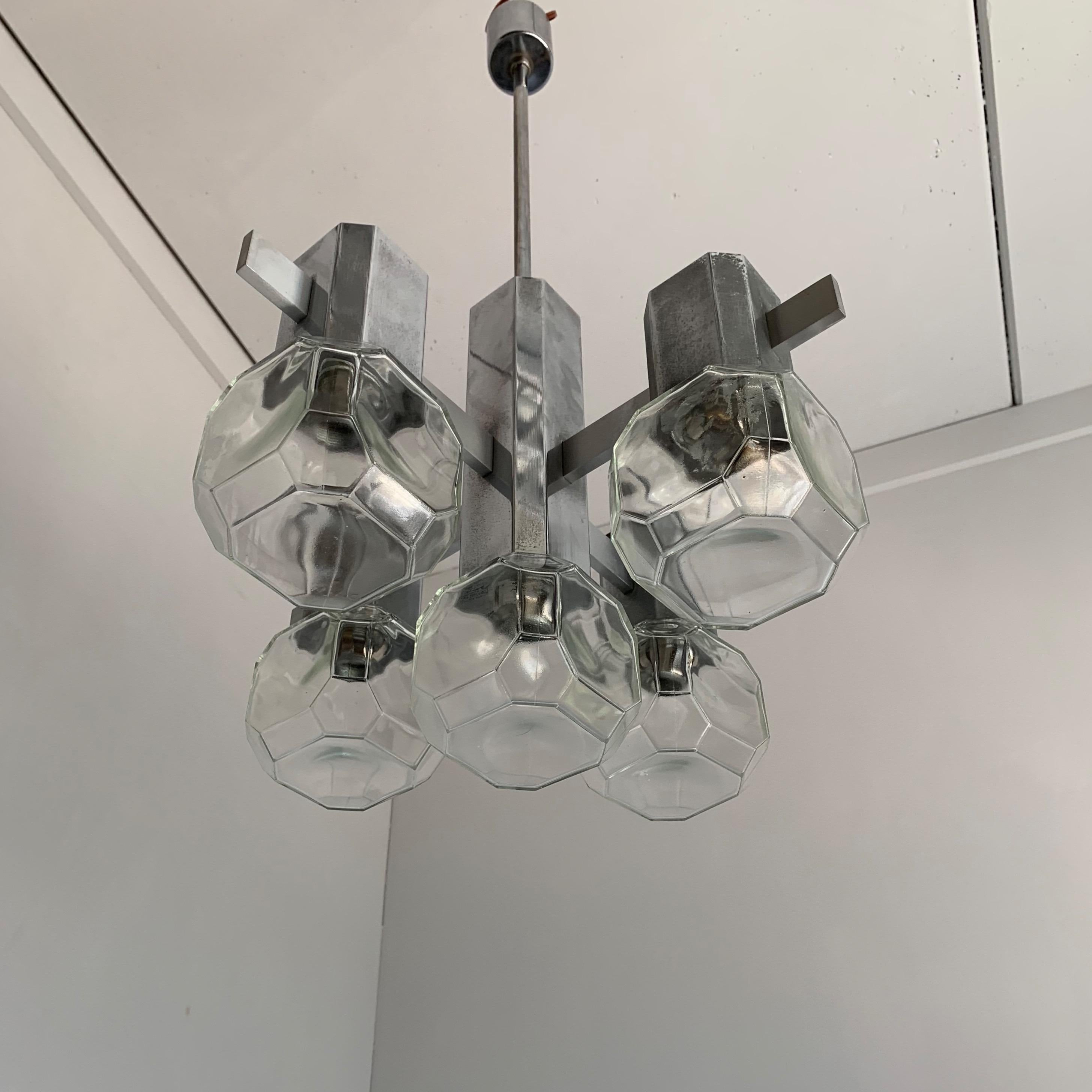 Rare and perfect design, Italian Murano Glass  chandelier.

This probably unique and truly geometrical, five-light pendant is entirely made of shiny chrome metal and it comes with all the original glass shades. This is a very strong make and the