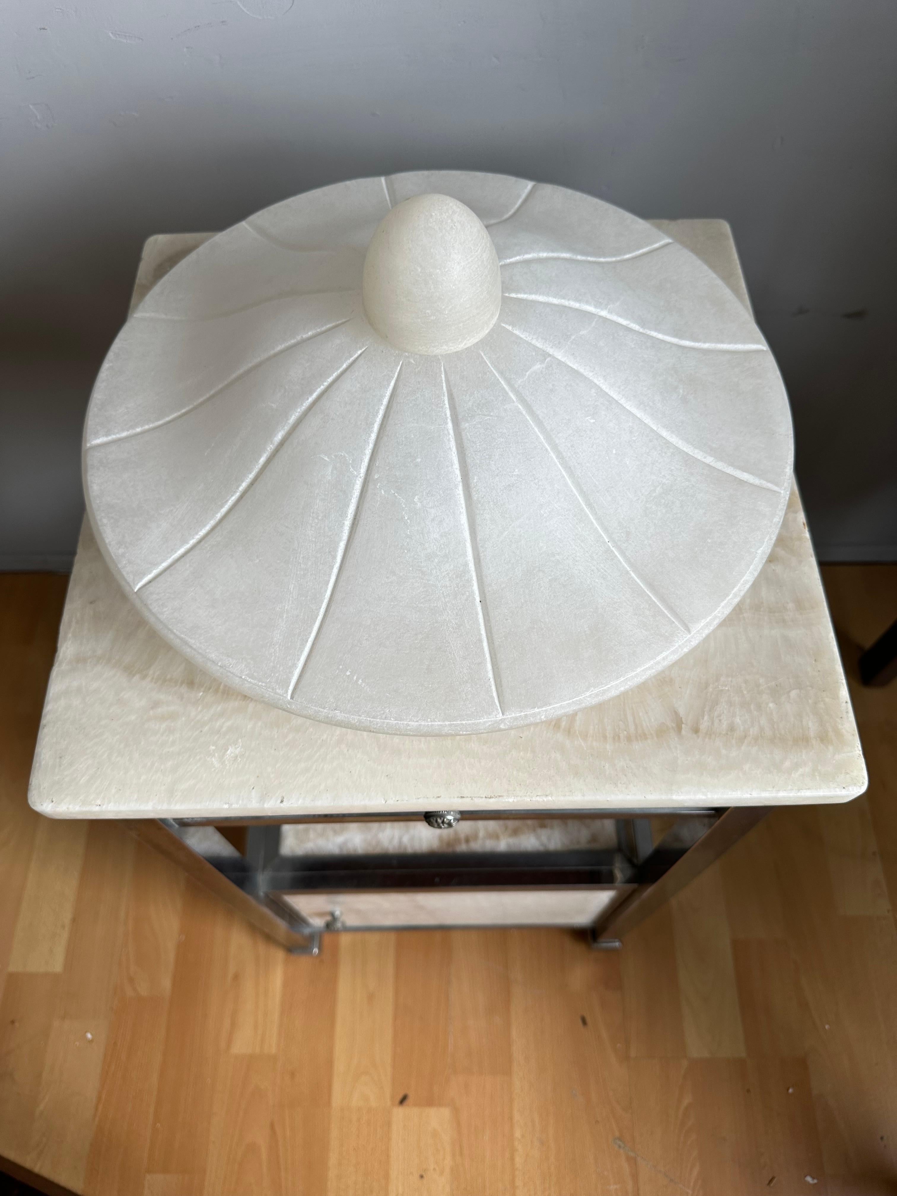 Rare design and good size alabaster flushmount.

This excellent quality and superb condition flush mount could be your perfect lighting solution. We have only seen  this striking design once before and for this rare light to be as good as new makes