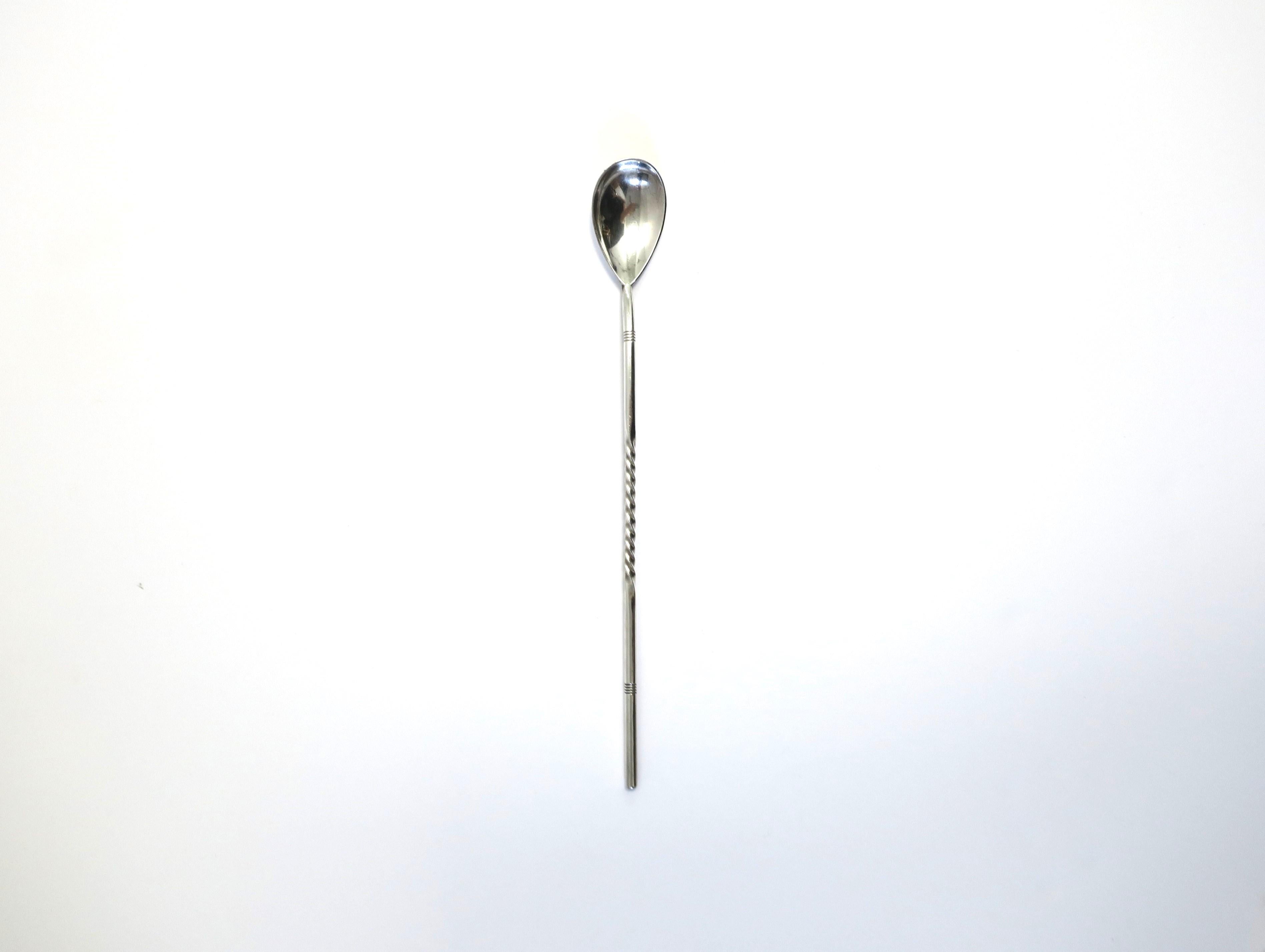 A silver-plate cocktail stirrer and spoon with twist detail, Midcentury Modern period, by Gorham Co., circa mid-20th century, USA. A great vintage barware piece for any bar, bartender, mixologist, etc. Makers' mark on underside, 'Gorham Co., 'N52',