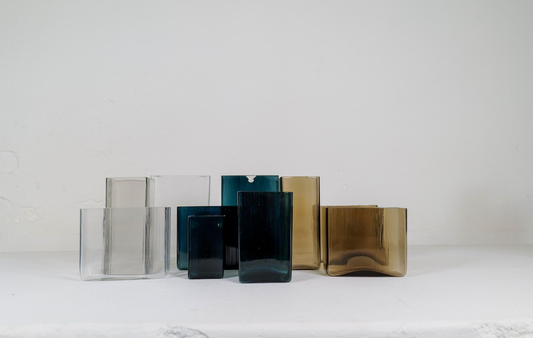 This collection of ten vases were made at Gullaskruf in Sweden 1960s and designed by famous Lennart Andersson. Because of their shape they were named Isi, which translates to Ice. Different colors of the vases that together gives a nice look.

Good