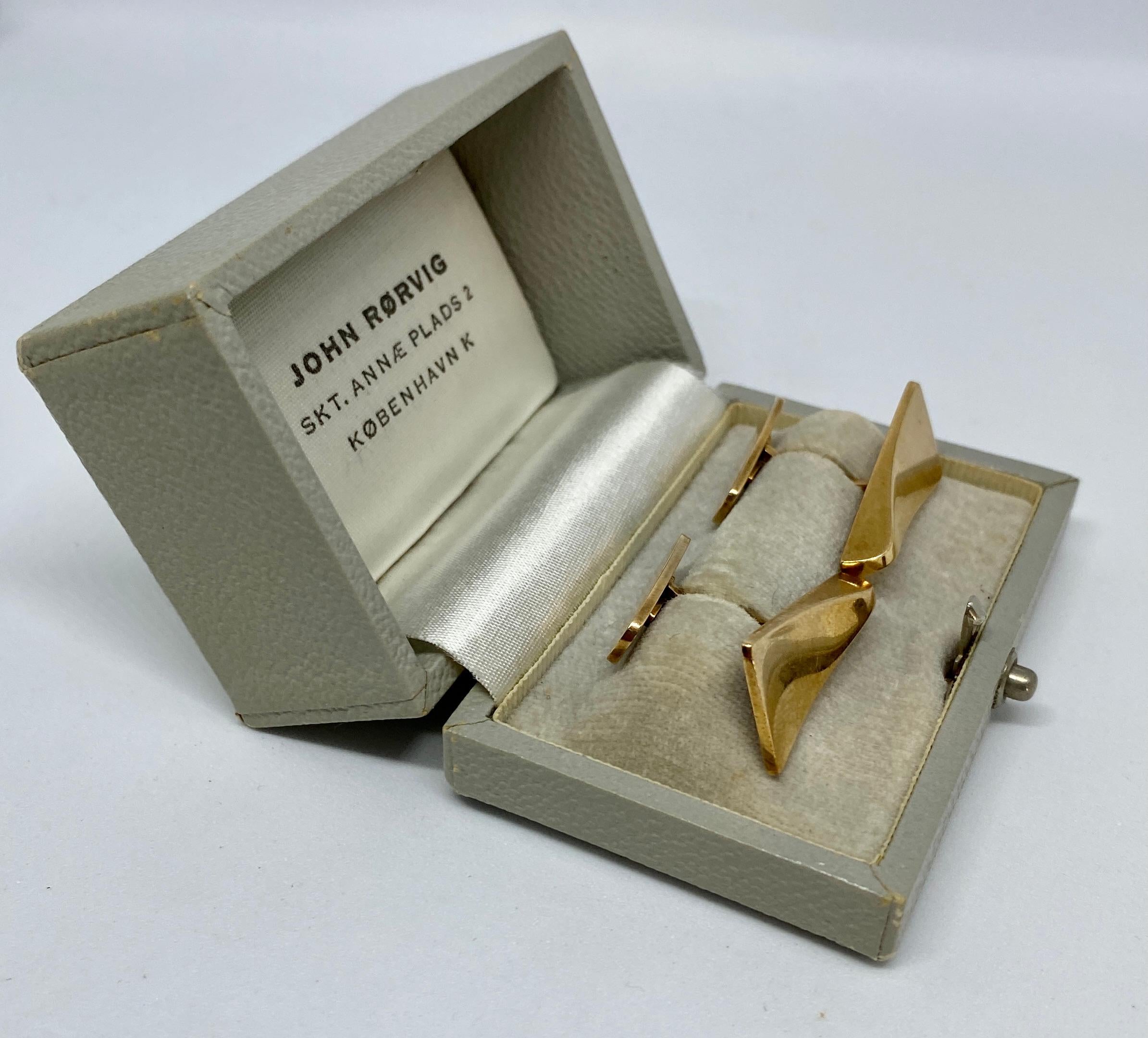 Fantastic and extremely rare cufflinks by John Rørvig of Copenhagen. 

Rendered in solid, 14K yellow gold, the cufflinks are in excellent vintage condition and come with their original, fitted box. 

The cufflink faces measure 26.6mm long and taper