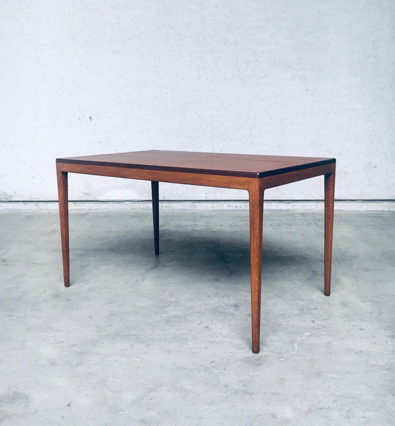 Vintage Mid-Century Modern German Design dining table by Hartmut Lohmeyer for Wilkhahn, made in Germany 1958. Slender minimalist designed table constructed in teak and oak. Tapered legs and rounded edges on this beautiful designed table. With it's