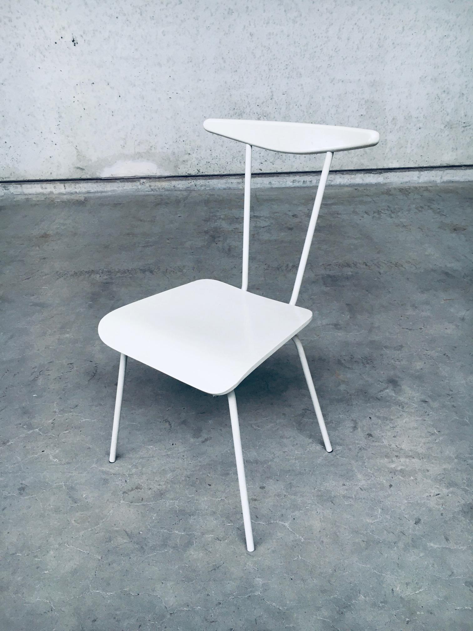 Vintage Mid-Century Modern Dutch Design Dress Boy chair by Wim Rietveld for Auping, made in the Netherlands, circa 1950's. Metal frame with bentwood plywood seat and steerhead backrest in original light grey color. In very good original condition.