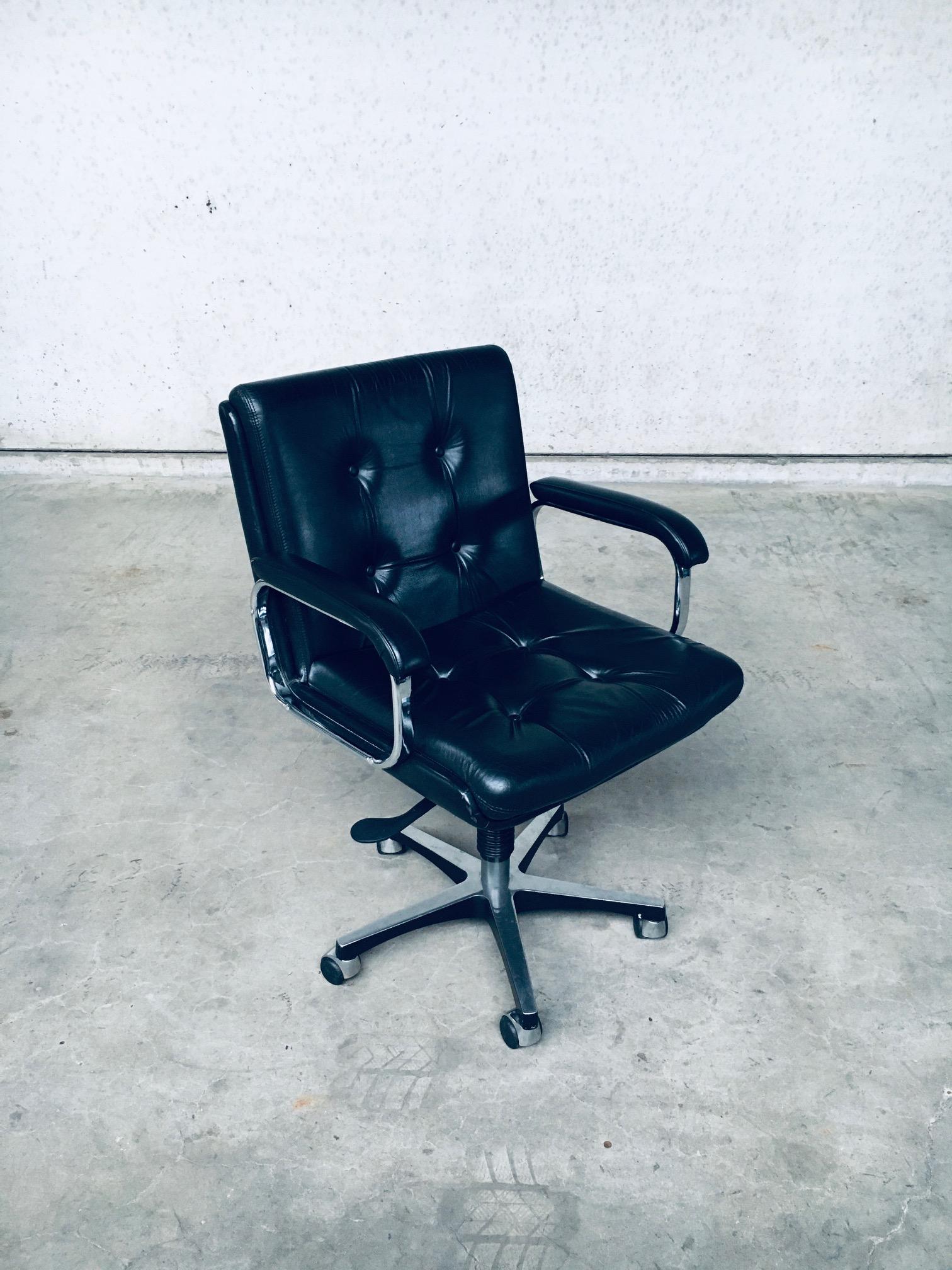 Vintage Mid-Century Modern Scandinavian Design leather office desk chair, made in Italy, 1988. Marked on the bottom of the chair, Made in Italy - 1988. This is exactly like the office chair by Ring Mekanikk of Norway, 1960s, but this is marked, Made