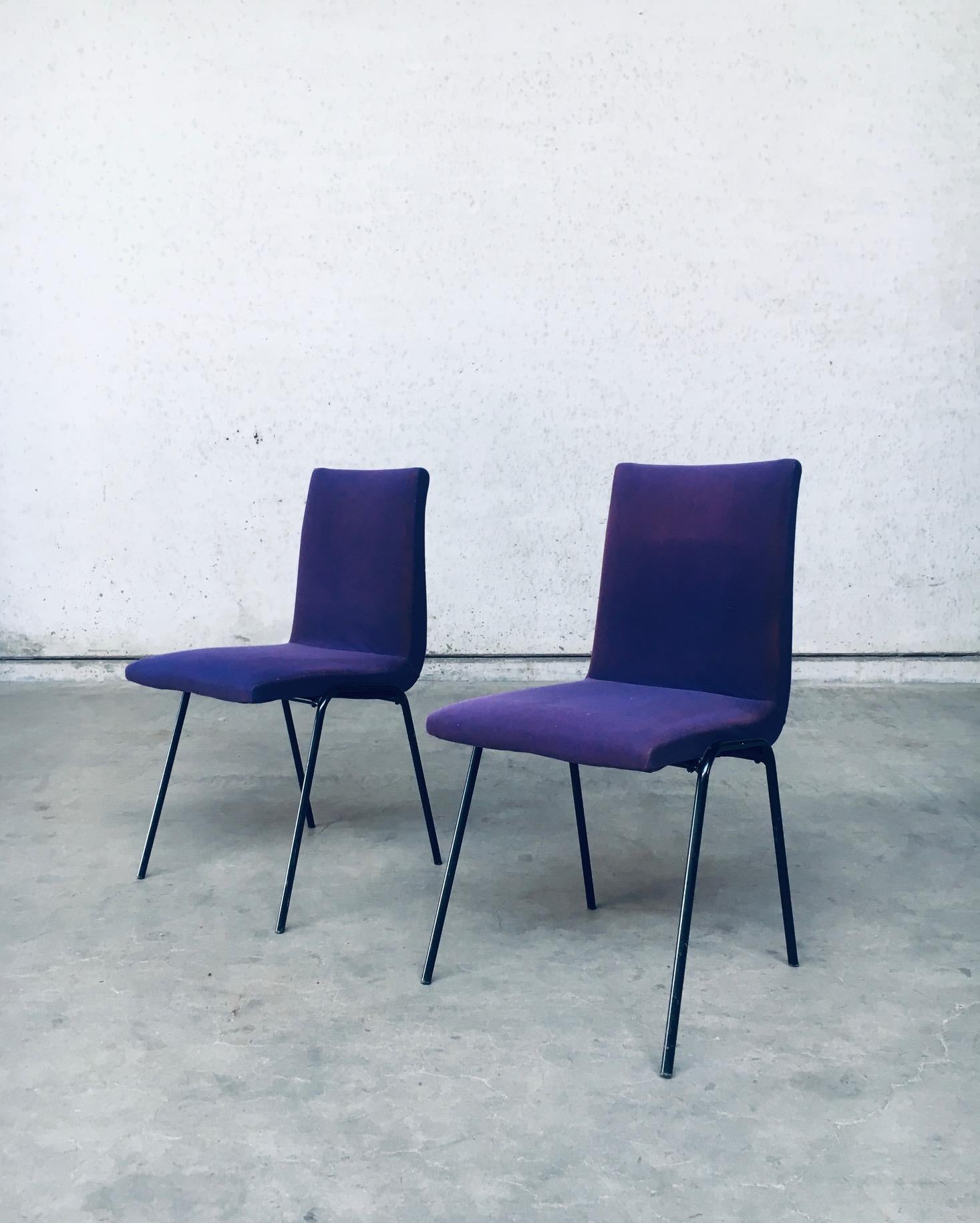 Vintage Mid-Century Modern design Robin dining chair set of 2 by Pierre Guariche for Meurop, made in Belgium late 1950's. All original purple fabric on seat on black metal frame base with original small stoppers at the feet. Both chairs are in very