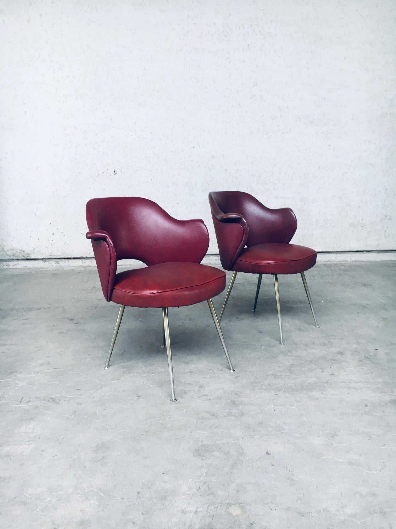 Vintage Mid-Century Modern Italian Design Skai leather office armchair set of 2. Made in Italy, 1950s. Bordeaux skai faux leather formed seat on brass covered metal legs. Beautifully shaped seat with small armrests in all original bordeaux red skai