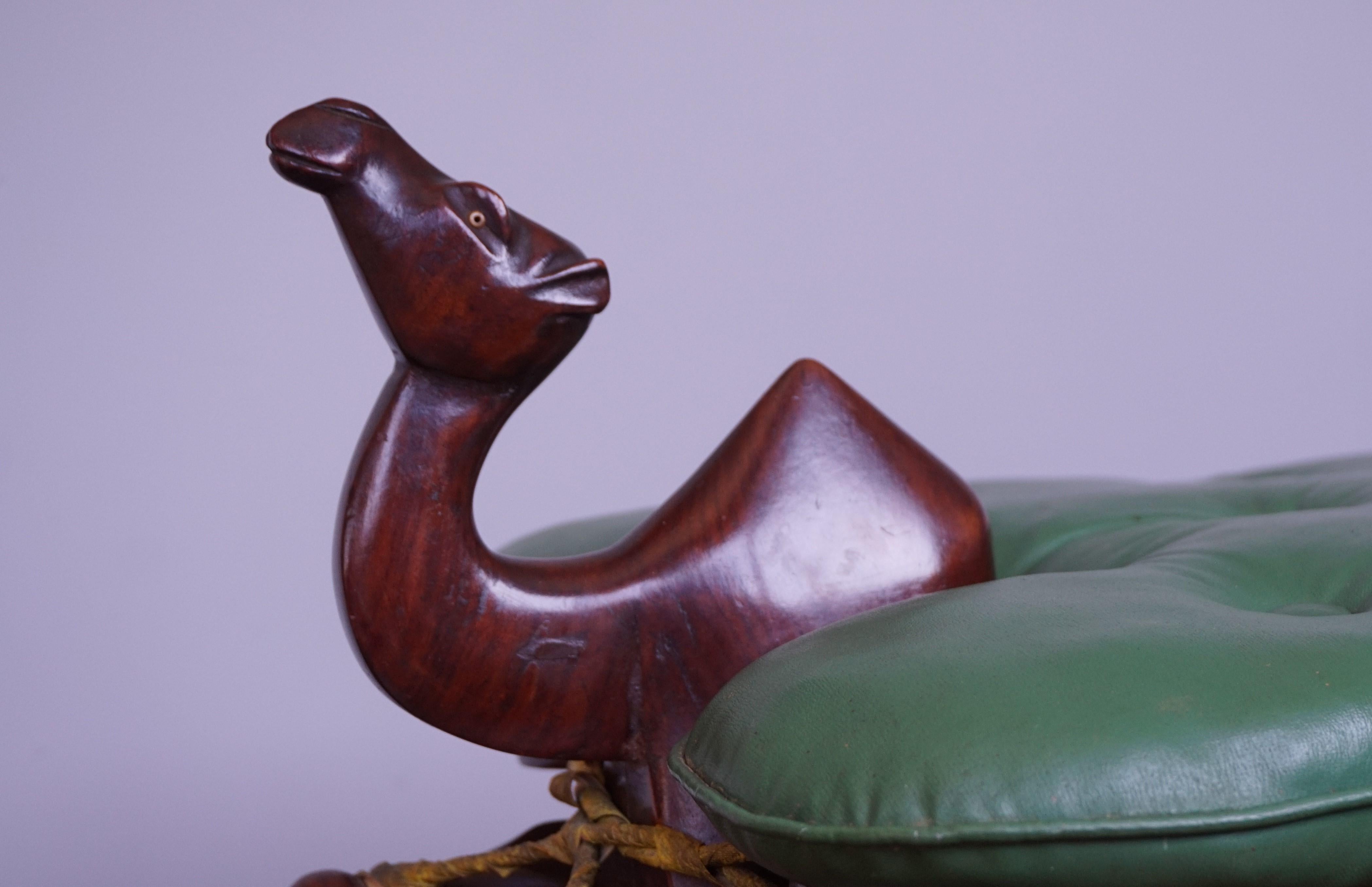 Hand-Carved Midcentury Modern Era Tropical Hardwood & Skai Leather Stool W. Camel Sculptures For Sale