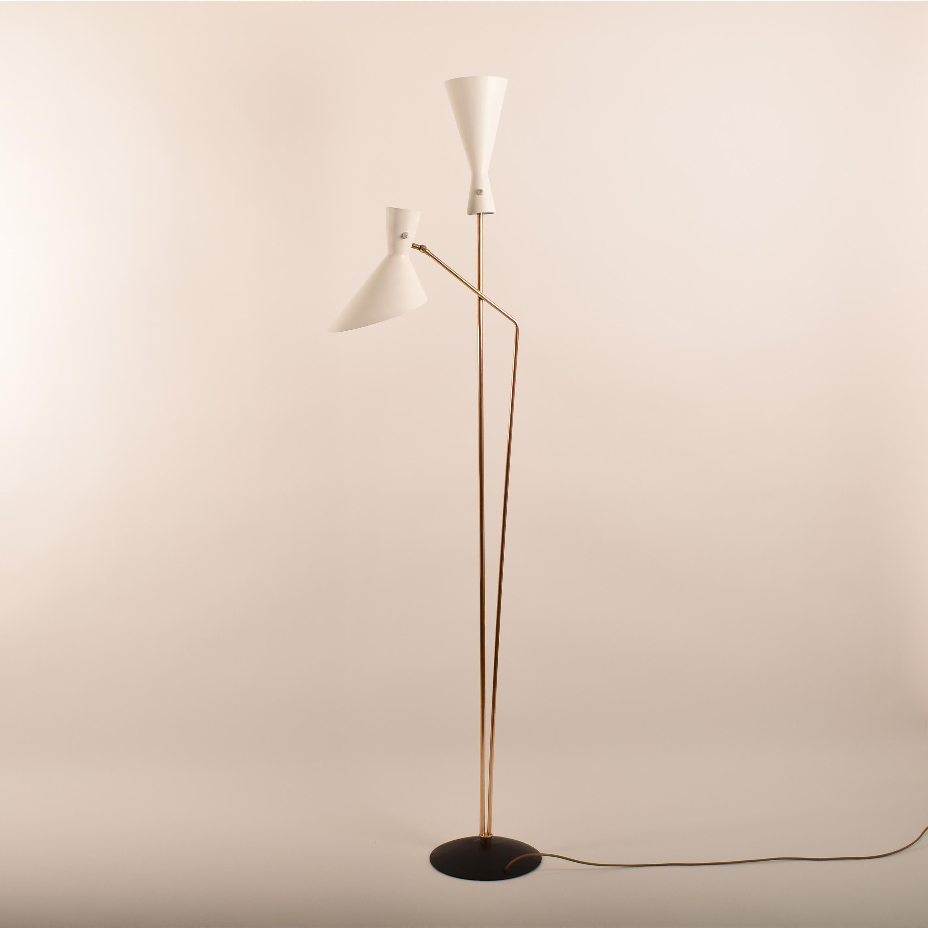 The Bag Turgi lamp designed by Carl Moor, is a vintage mid-century modern floor lamp created in the 1950s by the Swiss 
manufacturer BAG Turgi. 
This iconic lamp is known for its elegant and timeless design, 
embodying both functionality and