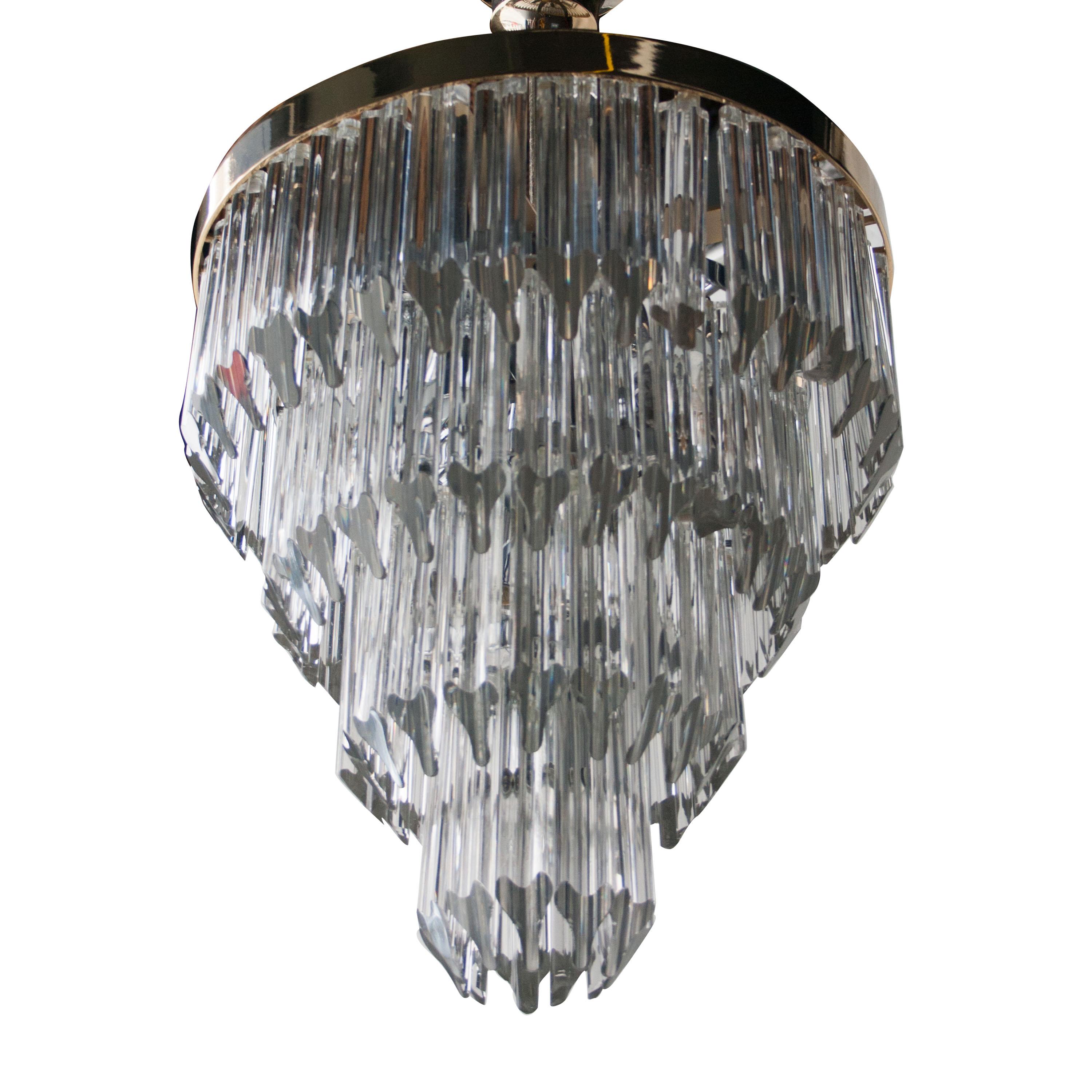 1970s Italian circled chandelier by composed of clear, multi-tiered, tubal pieces glass.