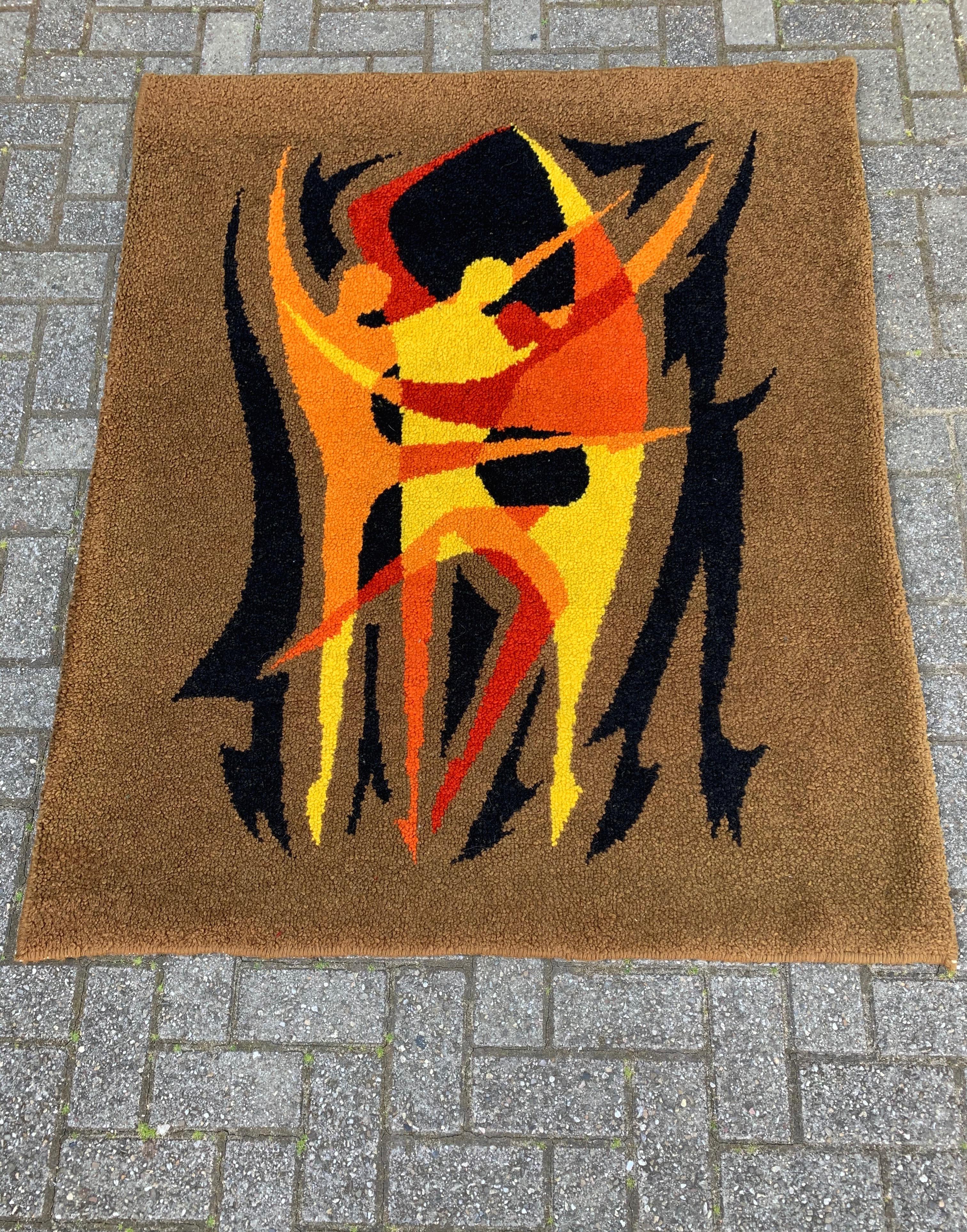 Good size and excellent condition woolen rug with great colors.

If you are looking for a unique and artistic carpet or wall rug then this midcentury specimen could be perfect. This sizeable and remarkably good condition rug comes with a stunning