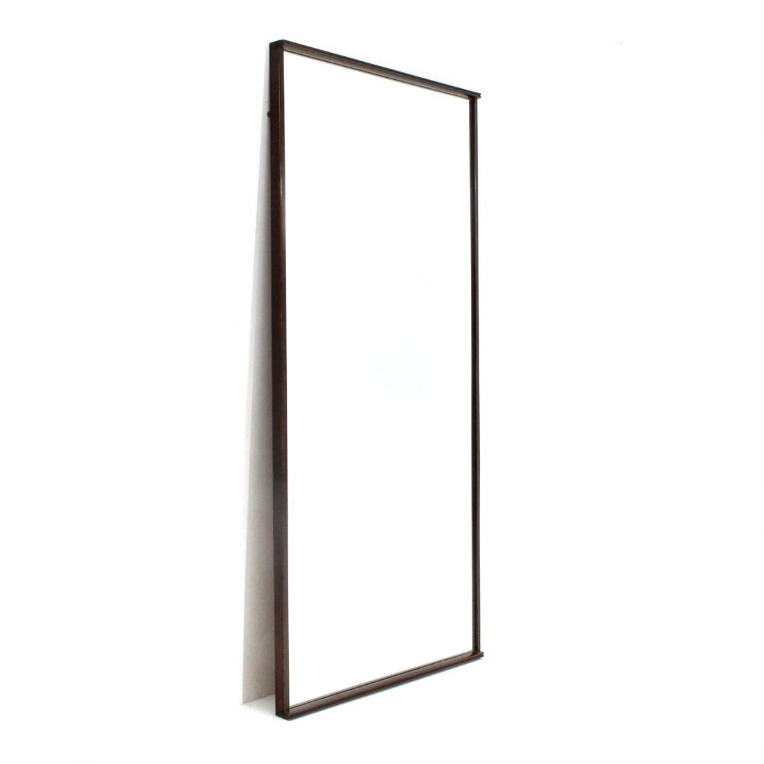 Italian manufacture mirror produced in the 1950s.
Wooden structure and frame.
Rectangular mirror.
Good general condition, some signs due to normal use of time.

Dimensions: Length 173 cm, depth 6 cm, height 82 cm.