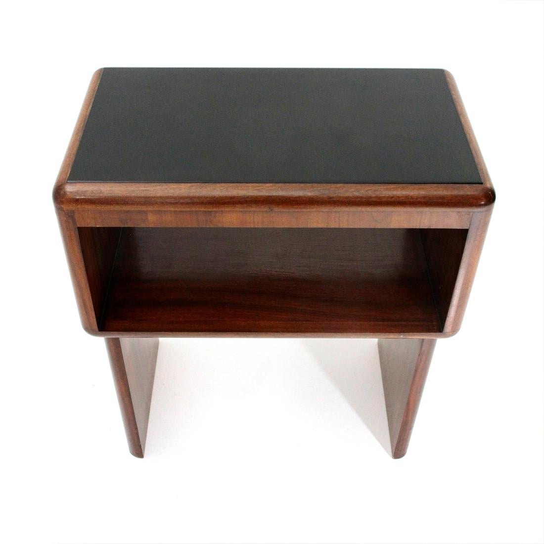 Italian-made little cabinet manufactured in the 1950s.
Structure in veneered wood.
Rounded corners and edges.
Upper top in black glass.
Good general conditions, some signs due to normal use over time.

Dimensions: Length 64 cm, depth 38 cm,