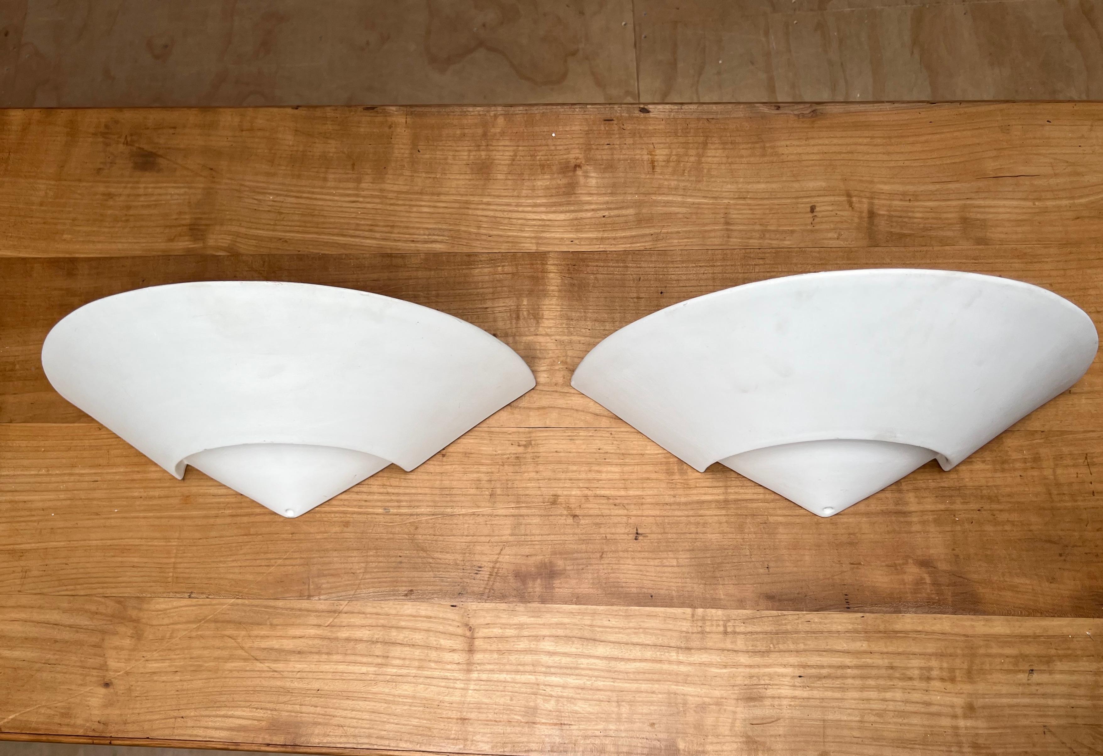 Great looking, easy to mount and beautifully handcrafted pair of plaster wall lights.

If you are looking for a stylish and timeless way to bring light into your entry hall, bathroom, kitchen or bedroom or if you are searching for the perfect wall