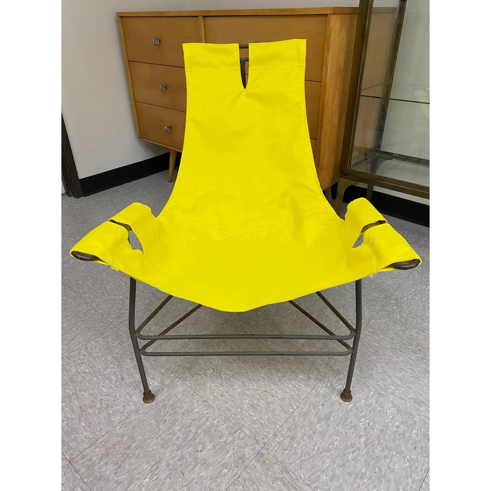 Newly upholstered in sunshine yellow canvas, slung onto original iron frames designed by Jerry Johnson for Leathercraft in 1954.

Original finish remains to frames with natural patina. We love to mix old and new, allowing the piece to refer to its