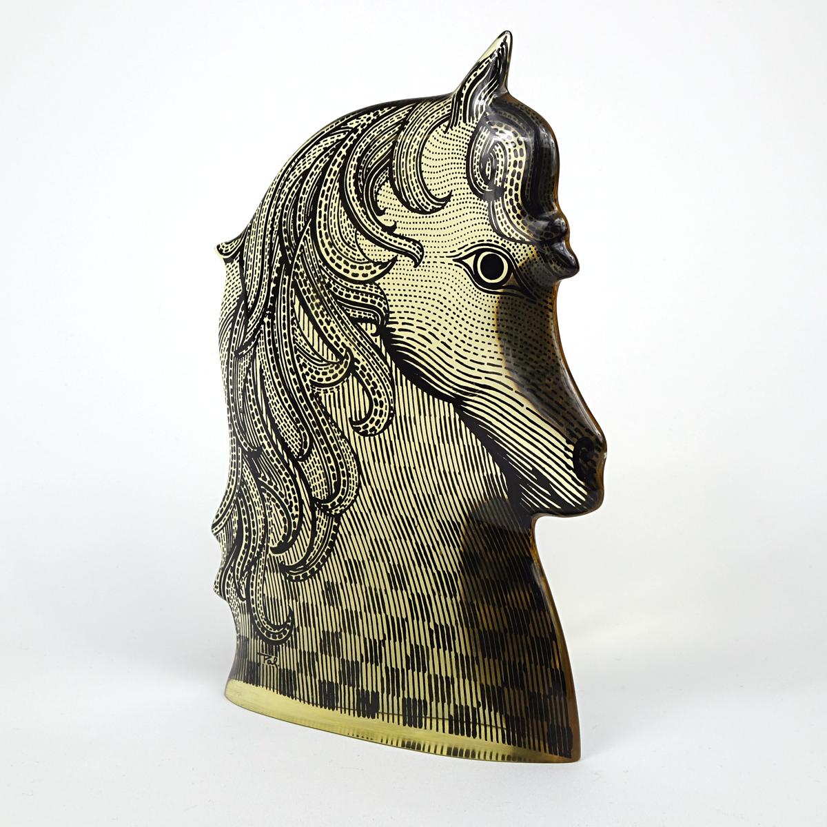 Large horse head made by Abraham Palatnik.

The Brazilian artist Palatnik (1928) was the founder of the technological movement in Brazilian art and was a Pioneer in making Kinetic sculptures.

In the late 40th (1949) he created his first