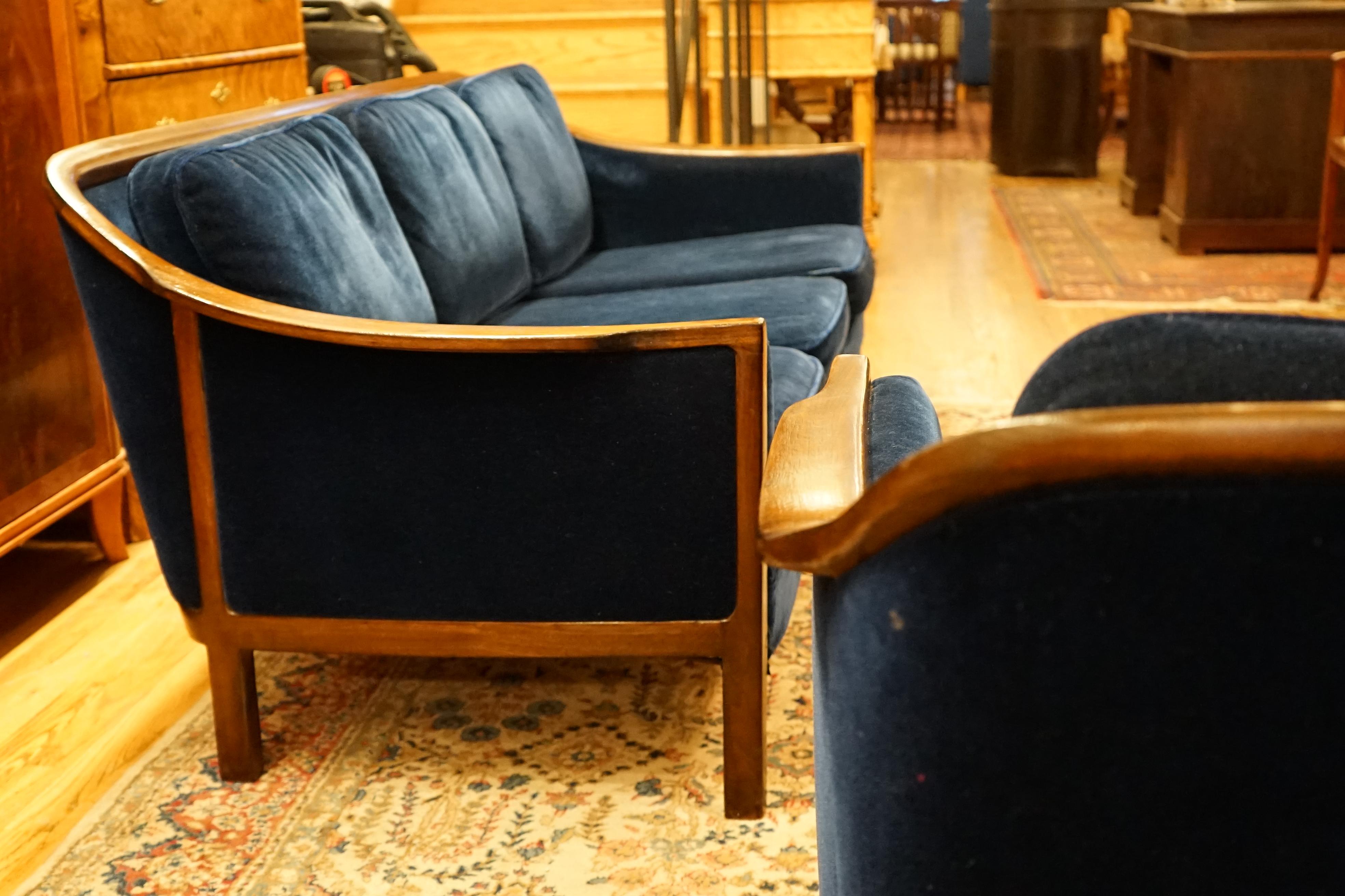 Suitable for a cocktail or entertainment area, this solid mahogany set has been fully refinished and reupholstered in deep blue mohair.