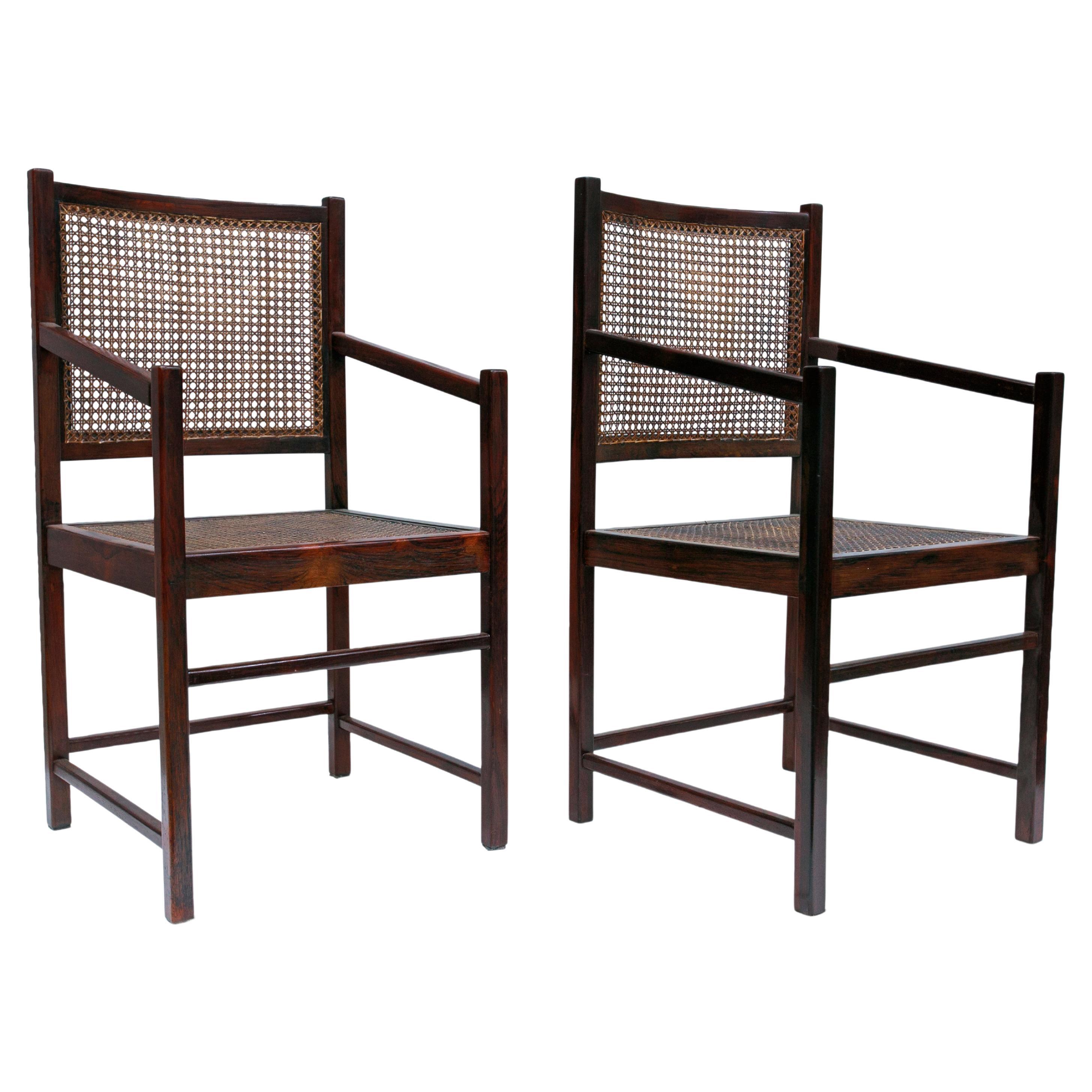 Available today, these Brazilian Modern Tall Armchairs in Hardwood & Handwoven Cane, are exquisite.

The armchairs are made of solid Brazilian Rosewood, as known as Jacaranda and handwoven cane in the seat and back. One of the chairs has new cane