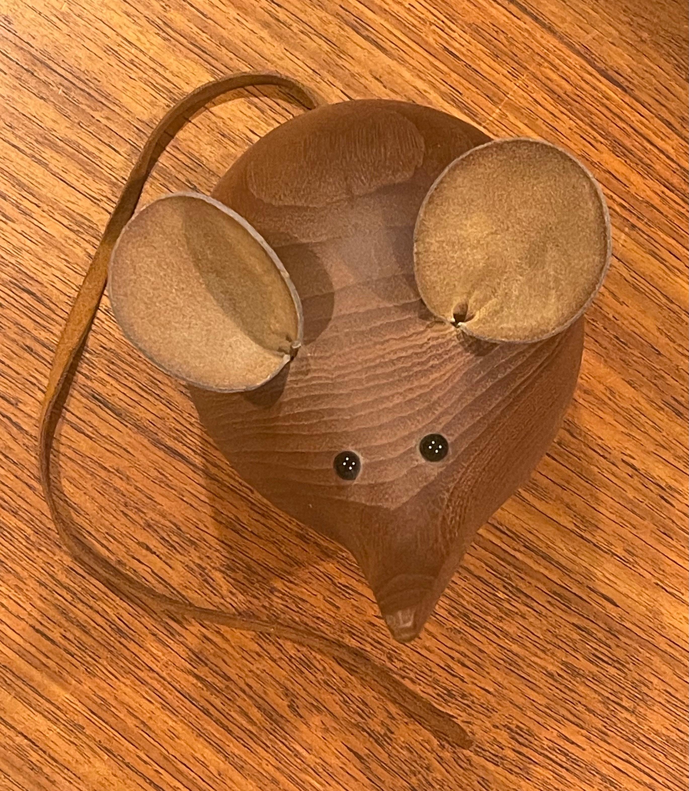 A very cool Mid-Century Modern mouse carving / sculpture in teak by H&F of Denmark, circa 1960s. A super cool and rare piece with a teak body, leather ears and tail (21