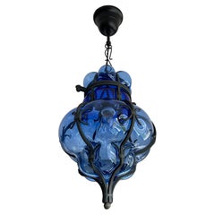 Mid-Century Modern Mouth Blown Venetian Blue Glass Pendant in Wrought Iron Frame