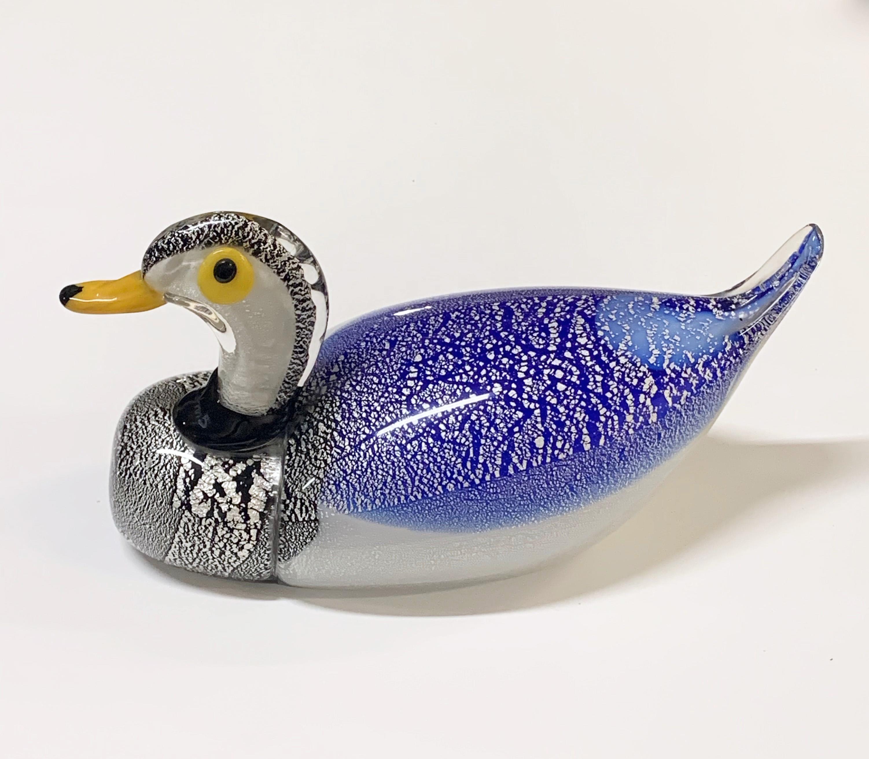 Large duck sculpture in artistic Murano glass with silver dots. This item was produced in Italy during the 1970s.

A Mid-Century Modern glass sculpture 