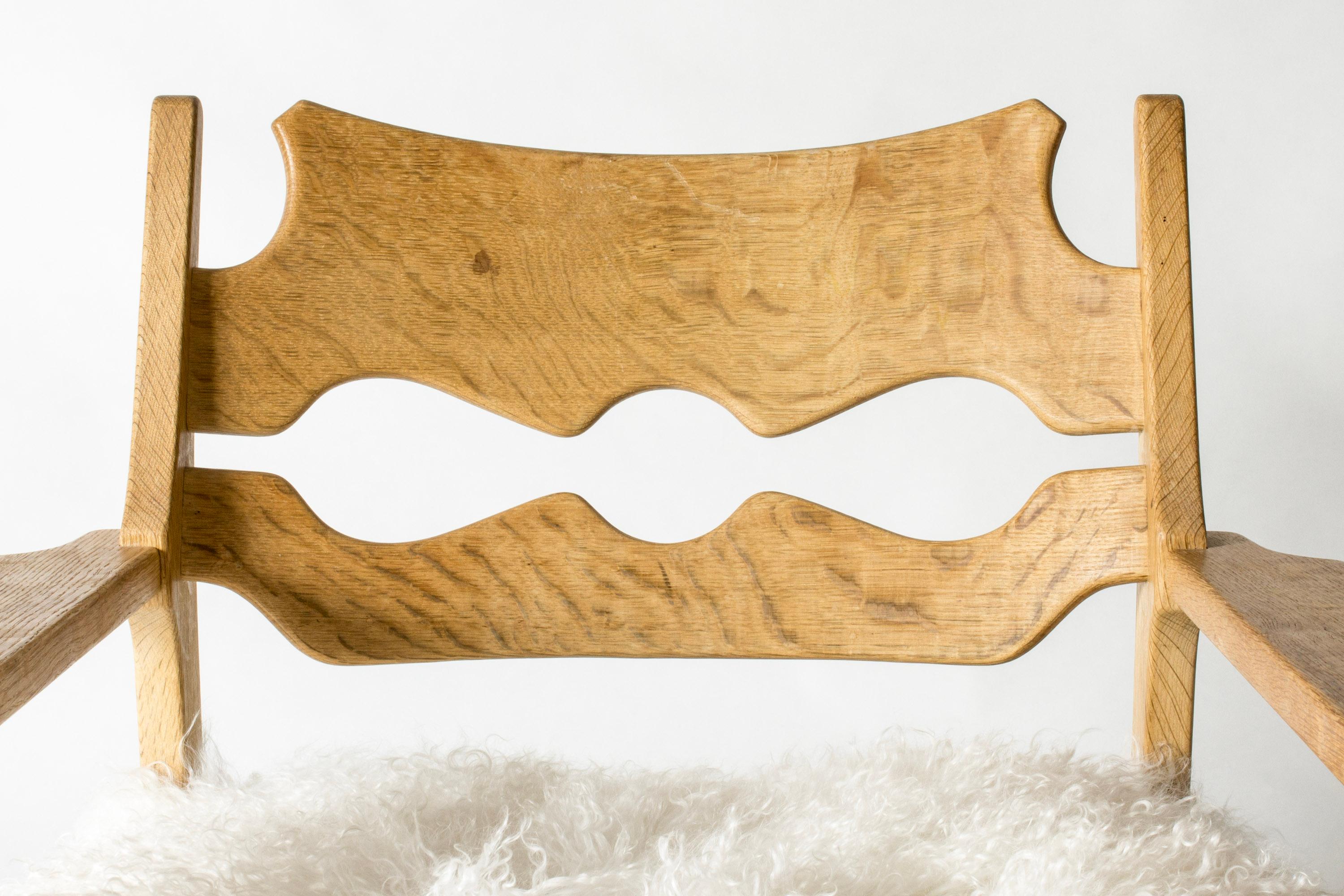 Danish Midcentury Modern Oak Lounge Chair by Henning Kjærnulf, Denmark, 1960s For Sale