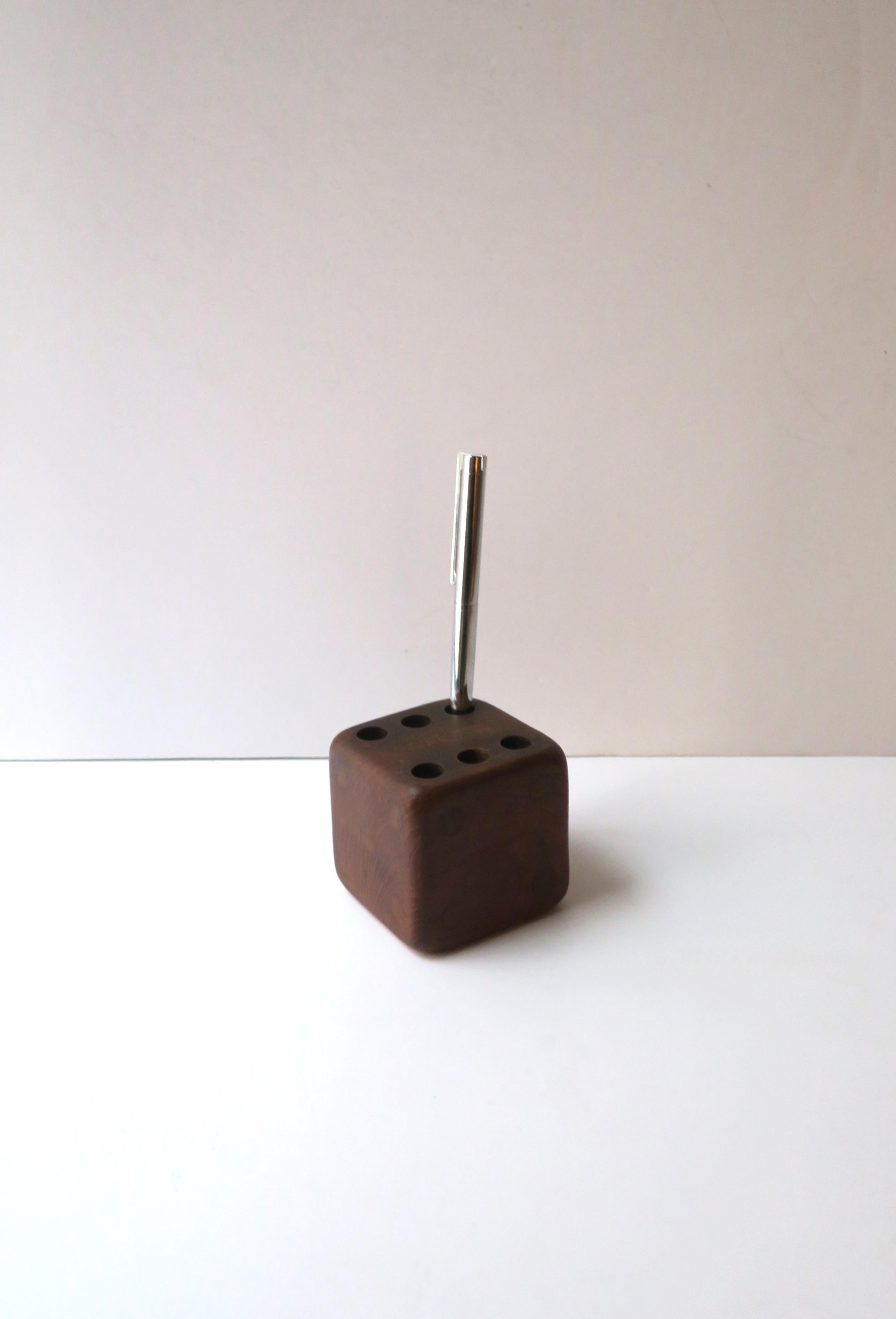 A Swedish wood pen/pencil holder dice/die, Midcentury Modern Scandinavian Modern period, circa mid-20th century, Sweden. A well-designed pen/pencil holder in dice/die form. Marked 'Sweden' as shown in last image. A great piece to contribute to a