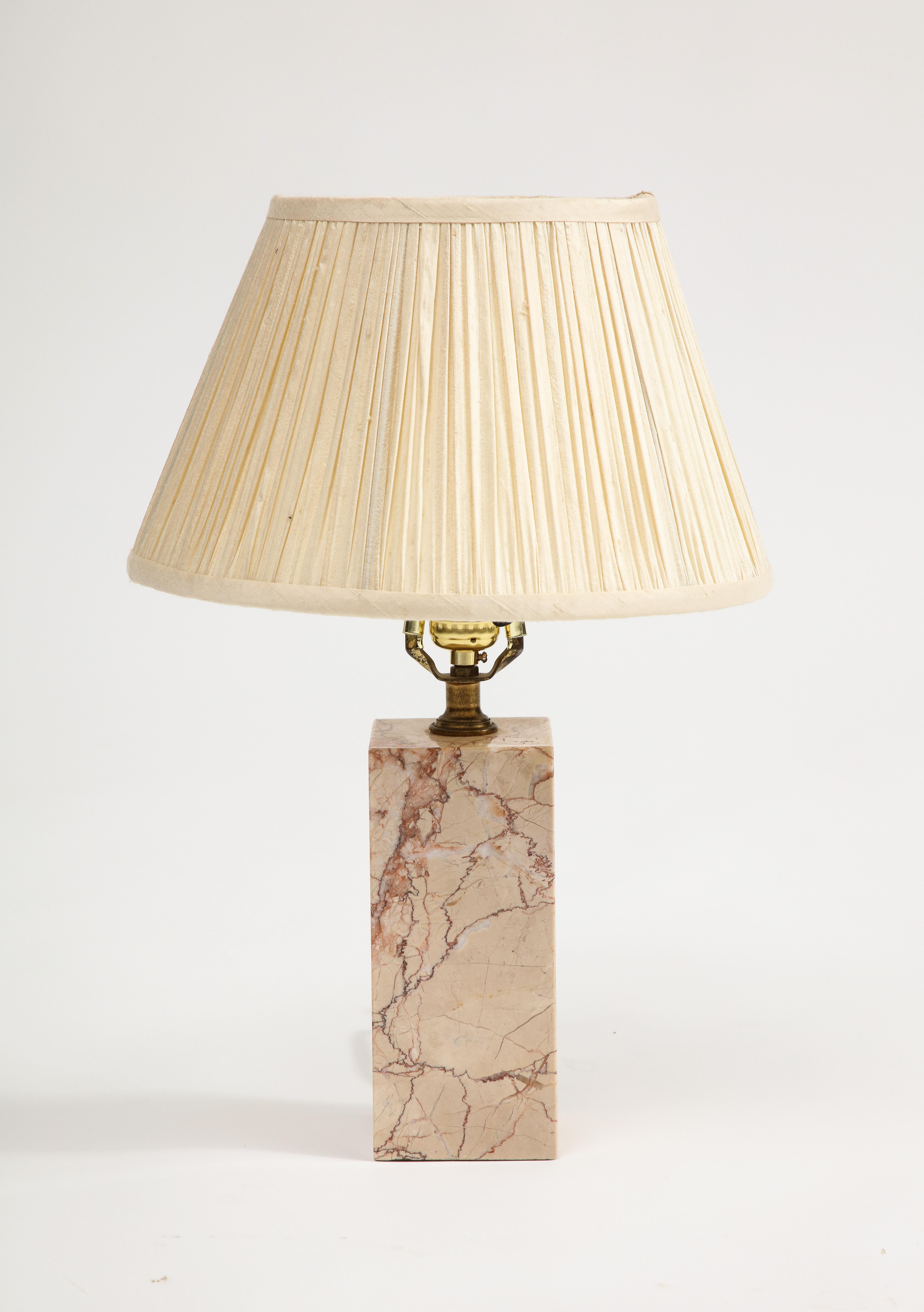 Midcentury Modern pink marble table lamp, attributed to T.H. Robsjohn-Gibbings. Comes with cream pleated lampshade. 

Additional Dimensions - 
With shade: 12