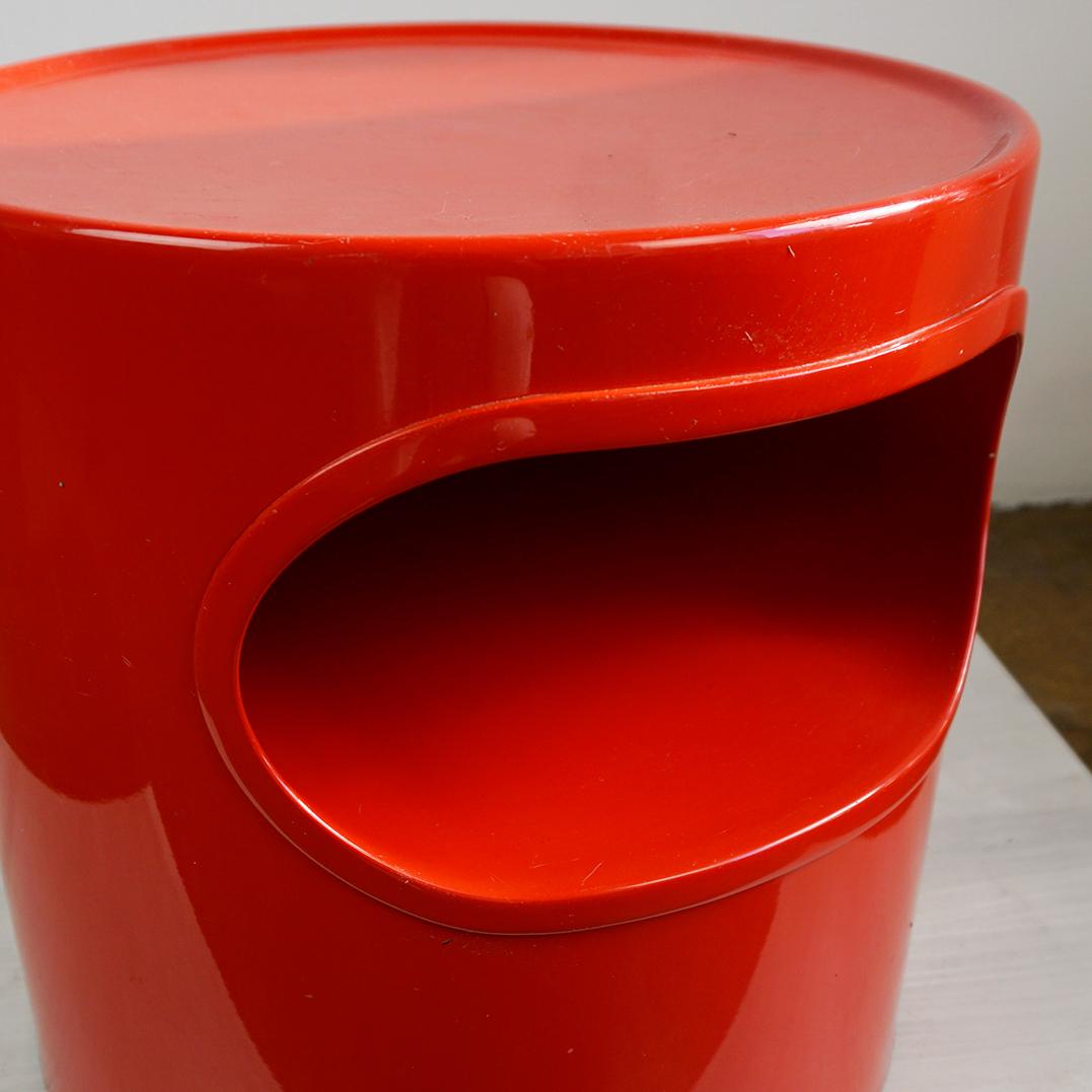 This charming red plastic side table was designed by Emma Gismondi Schweinberger for Artemide Milano Italy , model Giano Vano