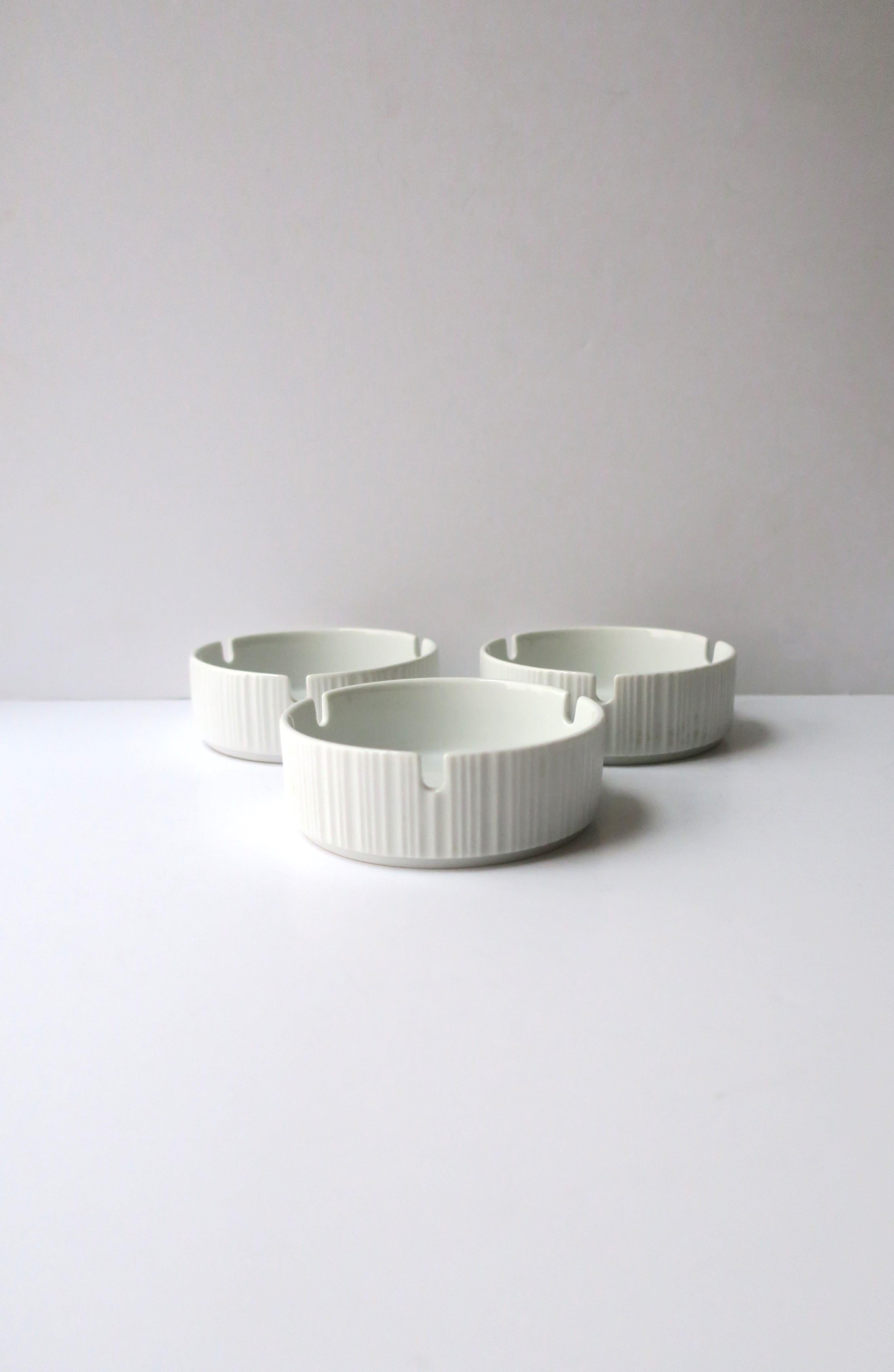 *Three (3) available, each sold separately, as per listing. 

German white porcelain ashtray (or catchall) in the 'variation' pattern, Midcentury Modern period, attributed to Finnish designer and sculptor, Tapio Wirkkala, for Rosenthal Studio-Line,