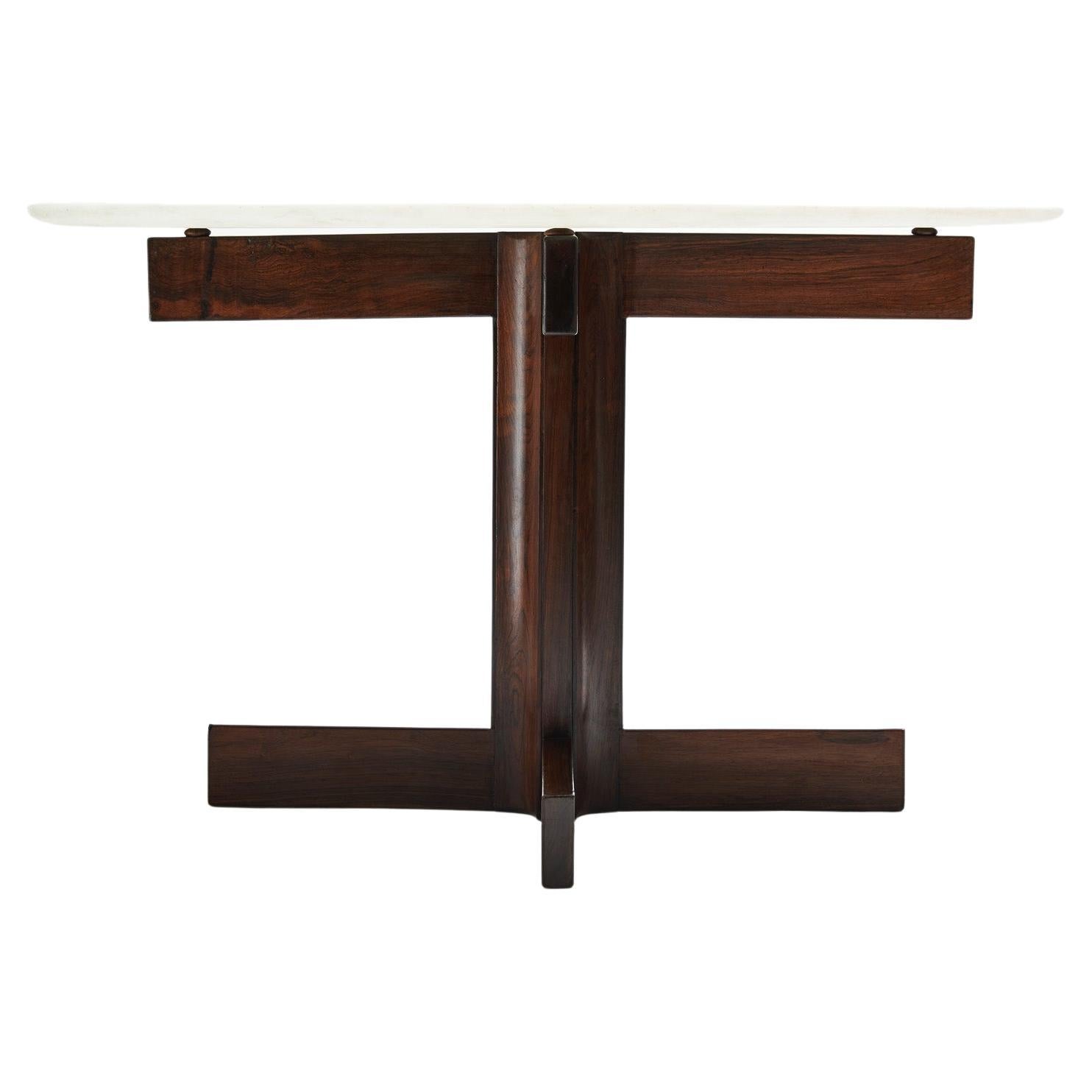 Available now, this Midcentury Modern Round Dining Table in Hardwood & Marble designed by Celina, in 1960’s Brazil is a stunning!

This Brazilian Modern beauty is executed in Brazilian Rosewood (as known as Jacaranda) with a 