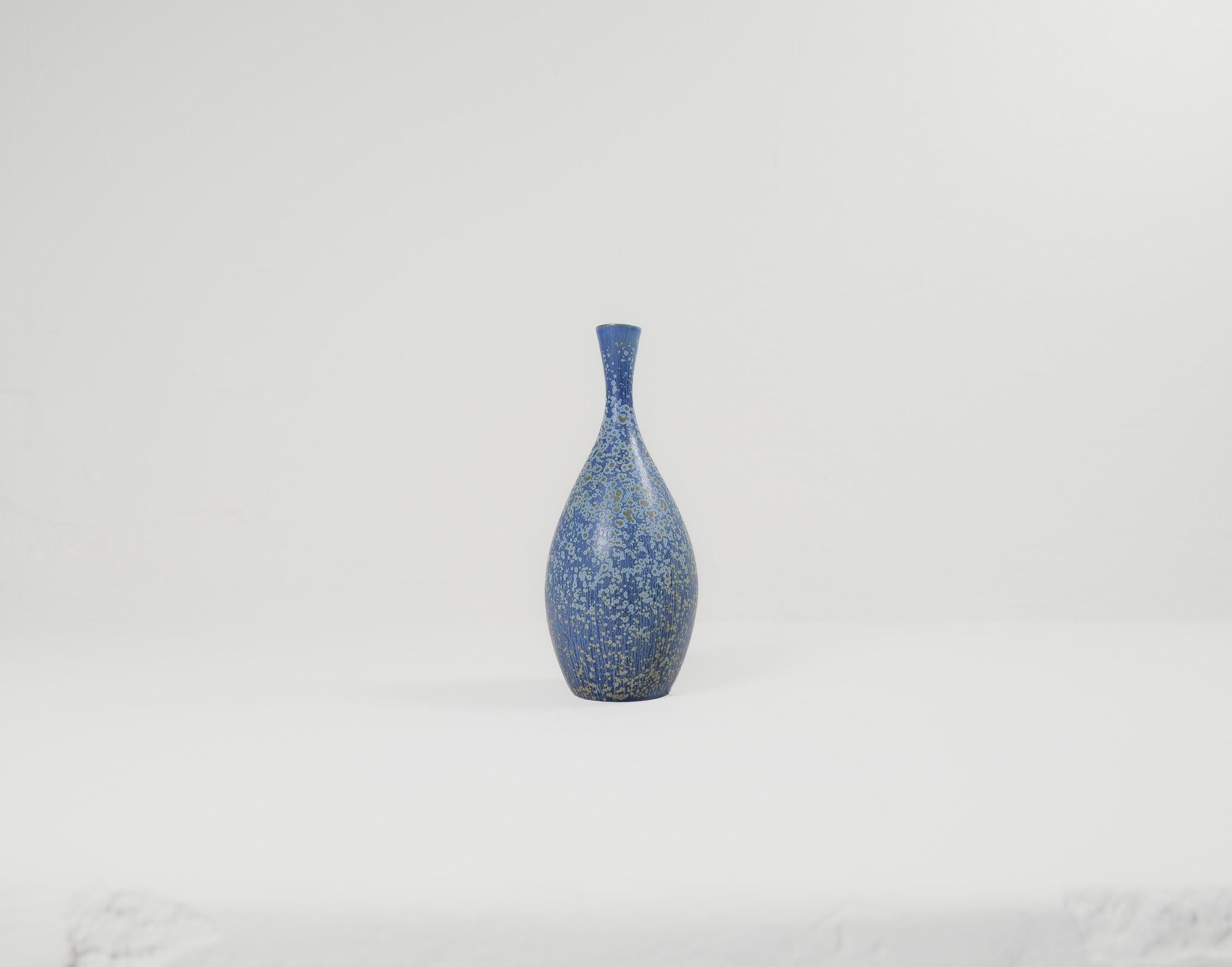 This stunning piece of ceramic was produced at Rörstrand and maker/designer Carl Harry Stålhane. Made in Sweden in the 1950s. Exceptional beautiful blue glazed vases with nice lines. Its rounded bottom with blue glaze and light blue green dots, the