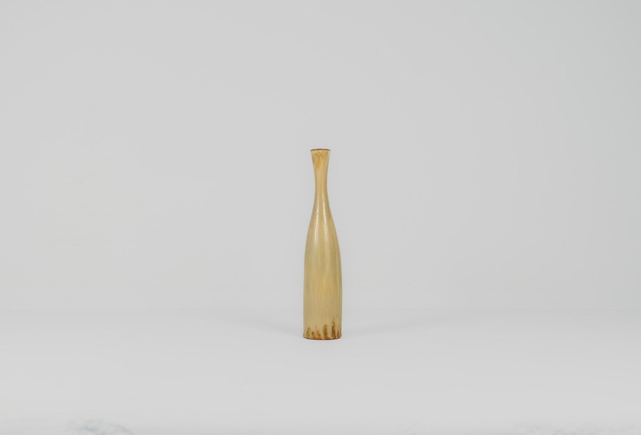 This vase from Rörstrand and maker or designer Carl Harry Stålhane, was made in Sweden in the midcentury. Its beautiful glazed combined with its incredible forms makes this an exceptional good piece.

Very good vintage condition.

Dimensions: Height