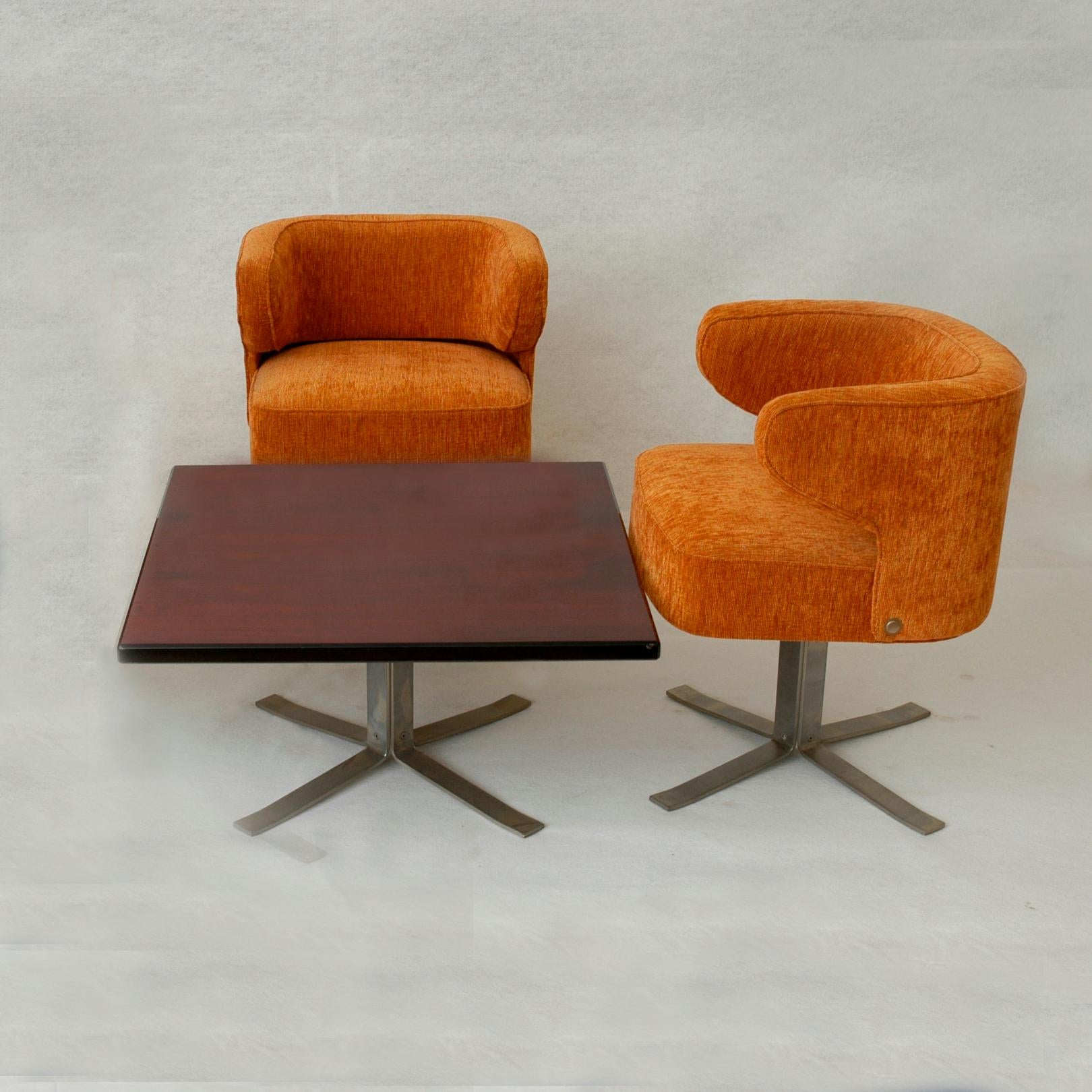 This set was designed by Gianni Moscatelli and produced by Formanova in 1970s. The frame is made from brushed steel and the armchairs have been reupholstered with orange high quality fabric some years ago.
Please note that sizes given in dimensions