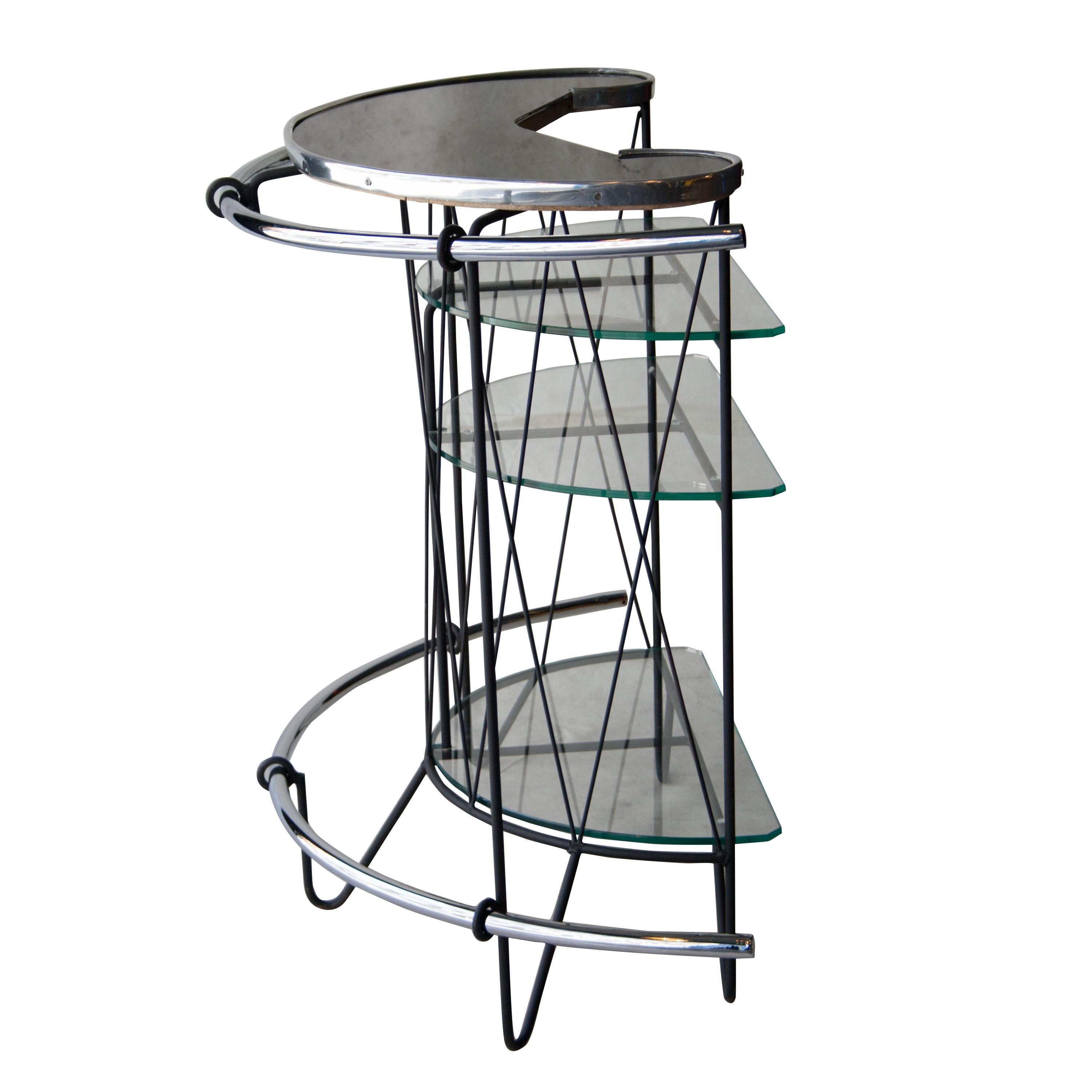 Midcentury Italian iron structured bar with three glass shelves and curved steel finishings.