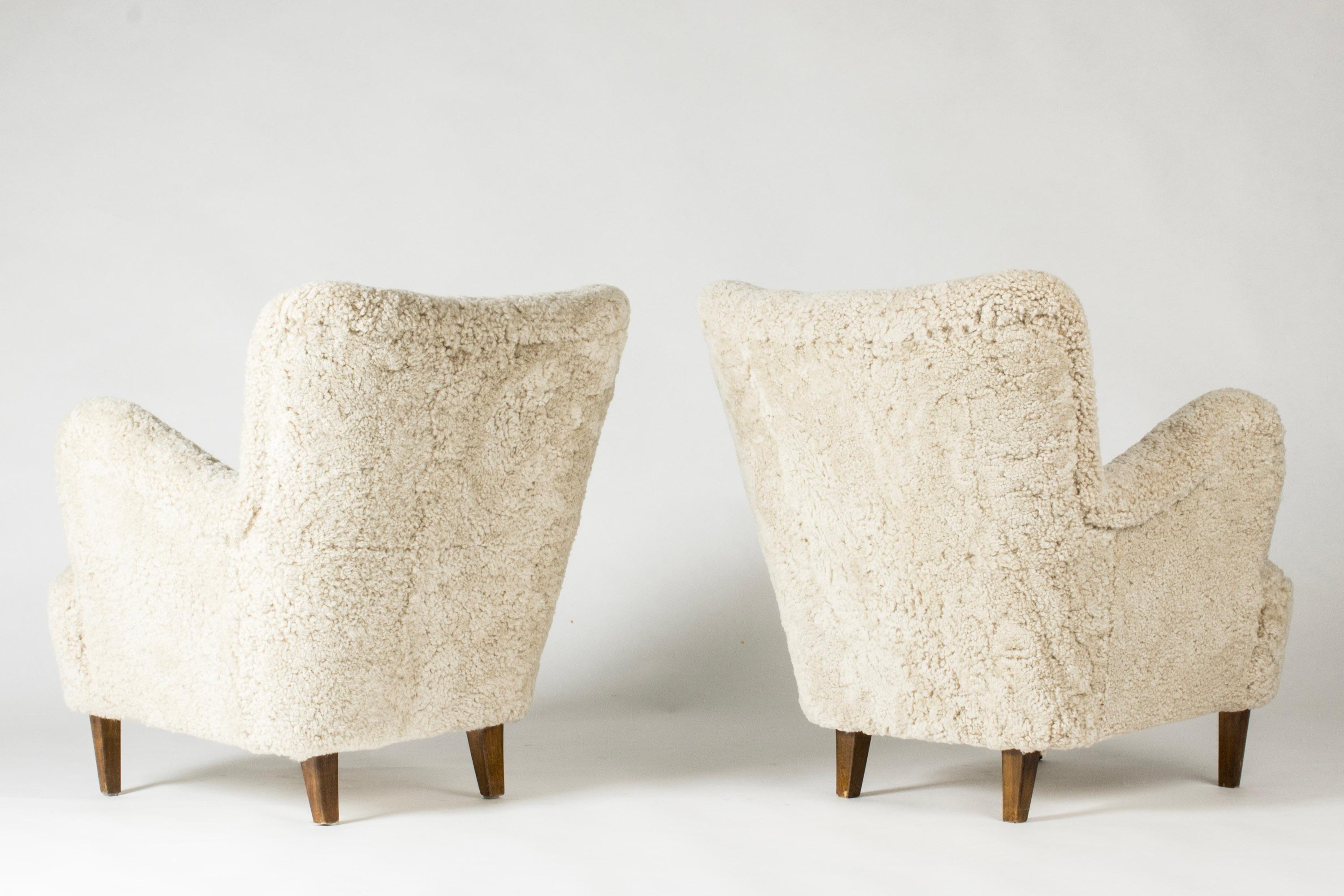 Scandinavian Modern Midcentury Modern Sheepskin lounge chairs, Sweden, 1940s For Sale