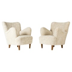 Used Midcentury Modern Sheepskin lounge chairs, Sweden, 1940s