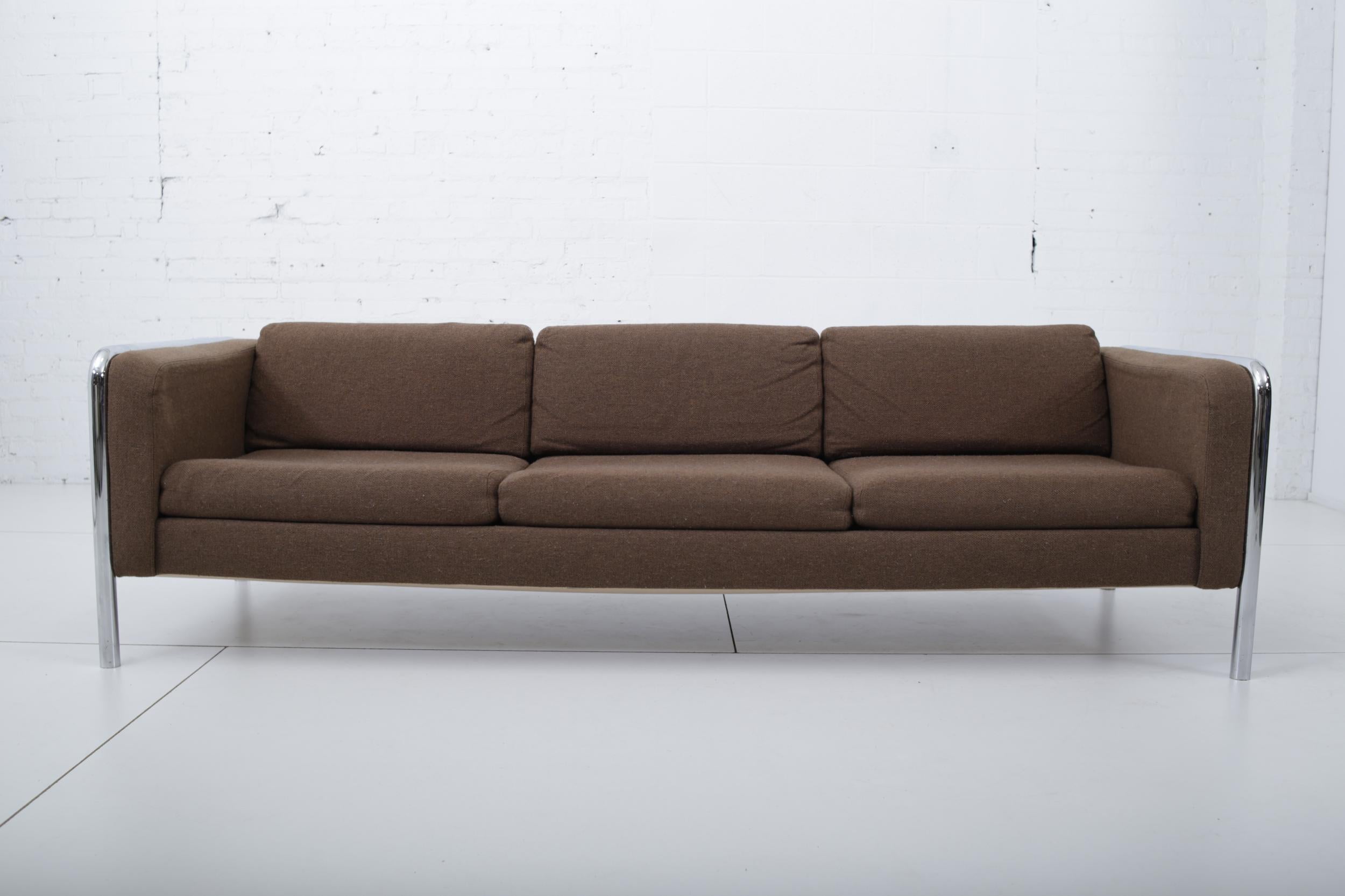 Mid-Century Modern sofa on tubular chrome frame with mushroom brown woven upholstery, circa 1970s.