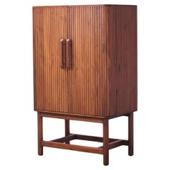 Midcentury Modern solid Oak wood Hide-a-Bar cabinet with pull out tray and brass