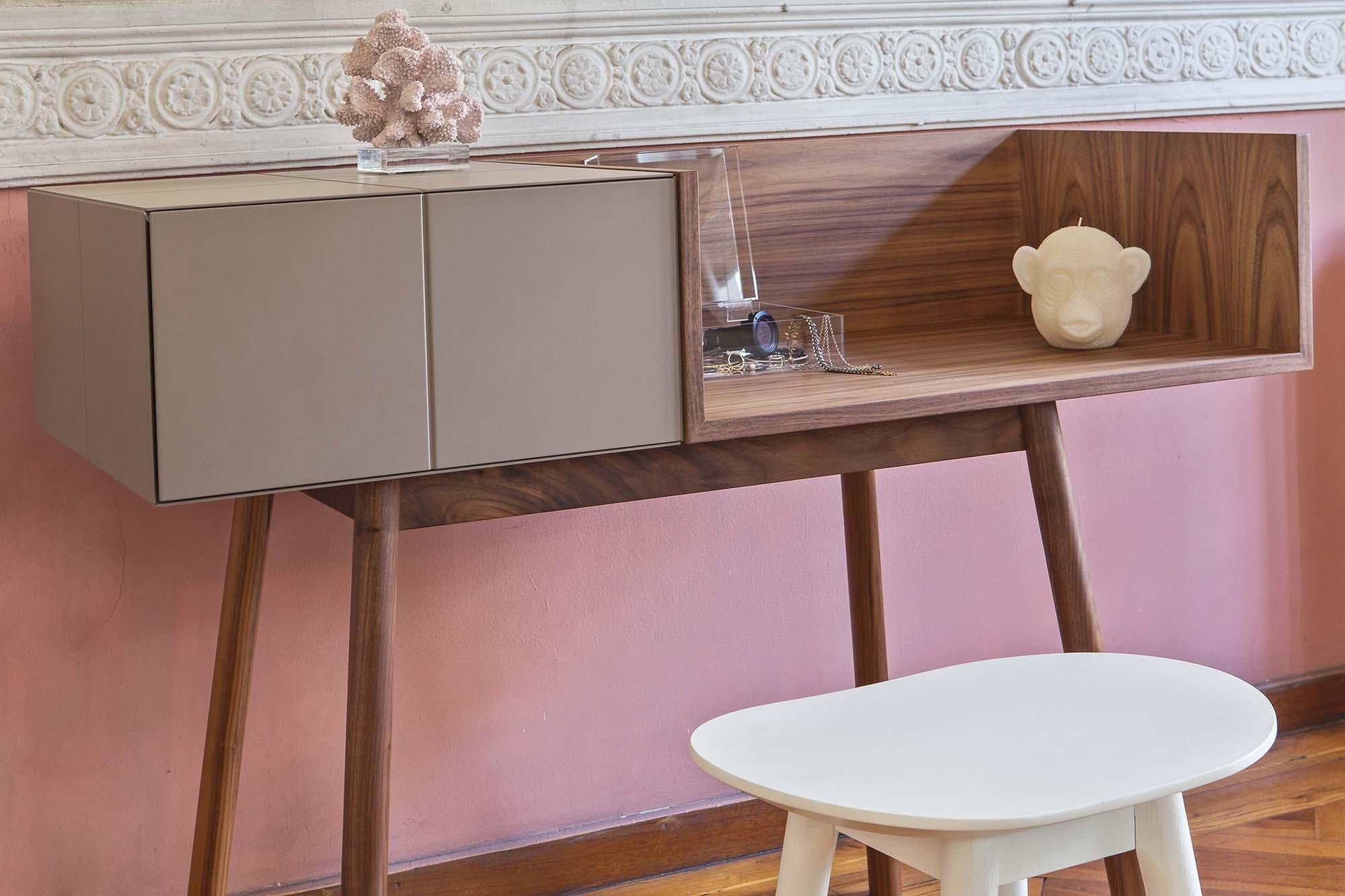 This boudoir desk is a compact and functional piece, designed with simplicity and practicality in mind. Its structure consists of a single drawer, an open storage compartment, and a sturdy wooden base. The design follows a consistent 10x10 inches