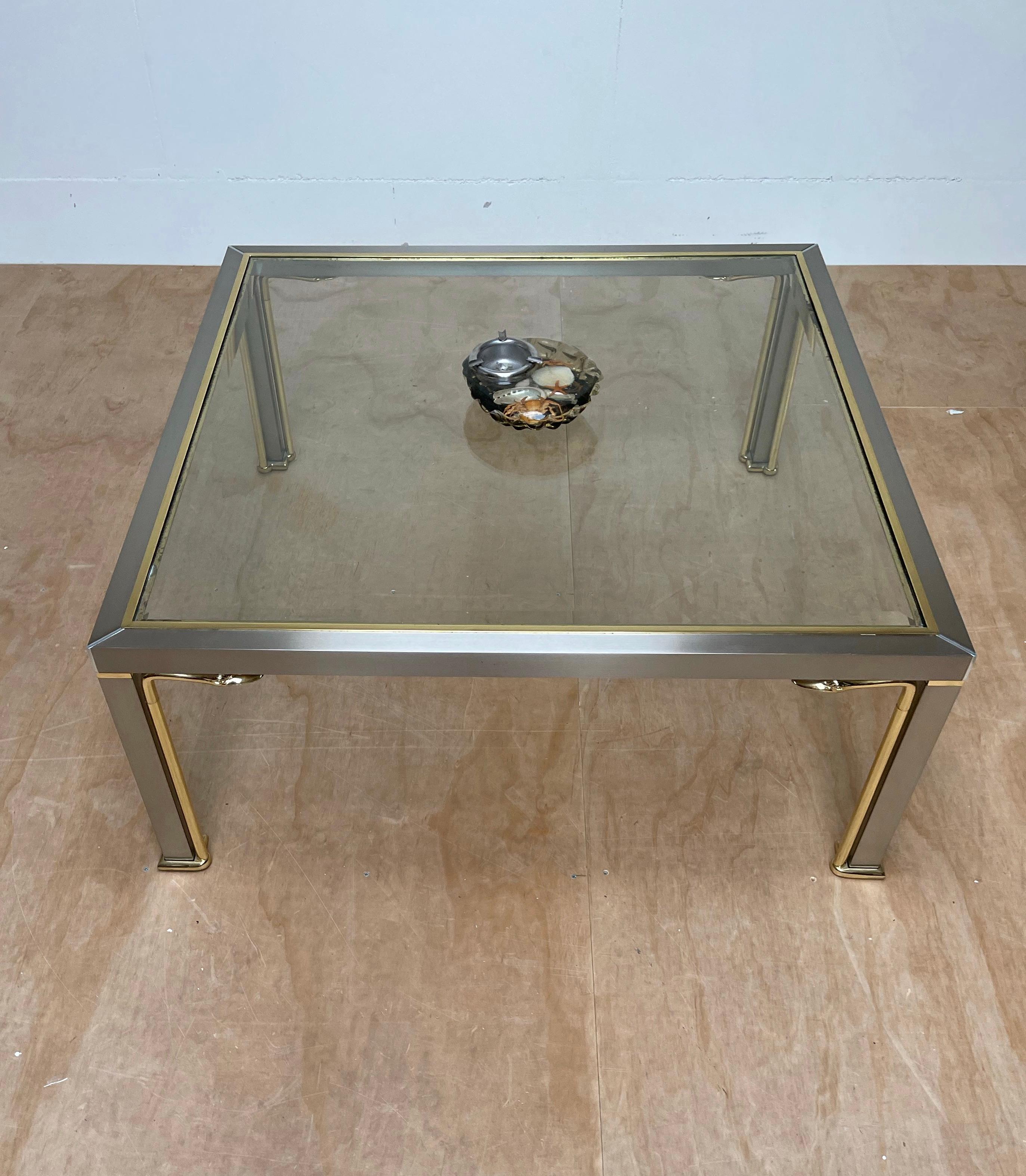 Beveled Mid-Century Modern Style Coffee Table with Glass Top and Bronze Swan Sculptures For Sale