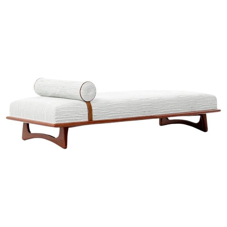 Achieving a seamless fusion of sturdy yet inviting materials, coupled with timeless craftsmanship, This Daybed pays homage to the ingenuity of classic American design. Crafted from solid Mahogany wood and adorned with refined leather accents, this