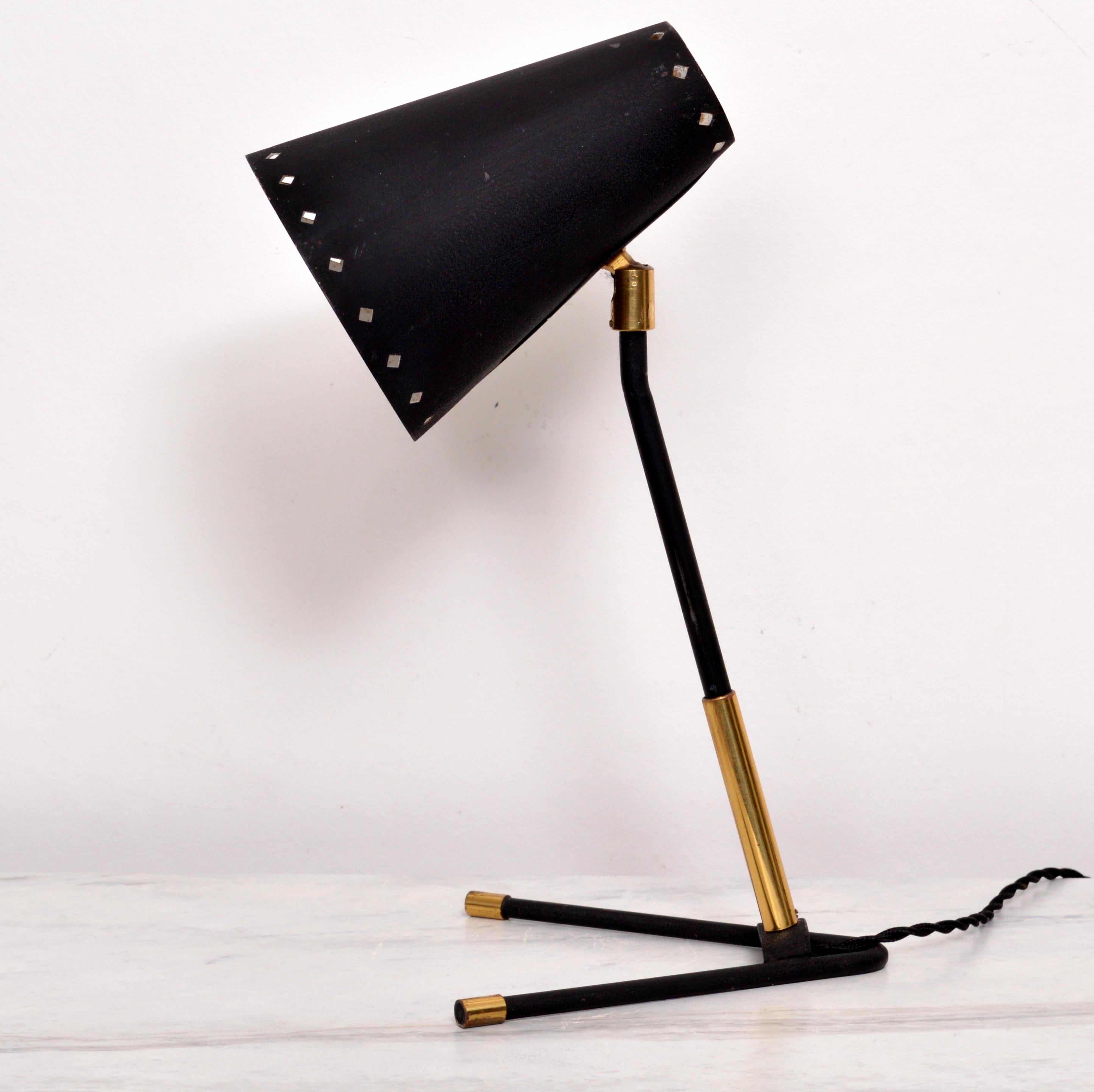 Table lamp model 8260 produced in Sweden by Boréns. Made during the 1950s. black lacquered metal with brass details.Boréns was a lighting company based in Borås that truly stand out among its equals during the mid 20th century. Always producing