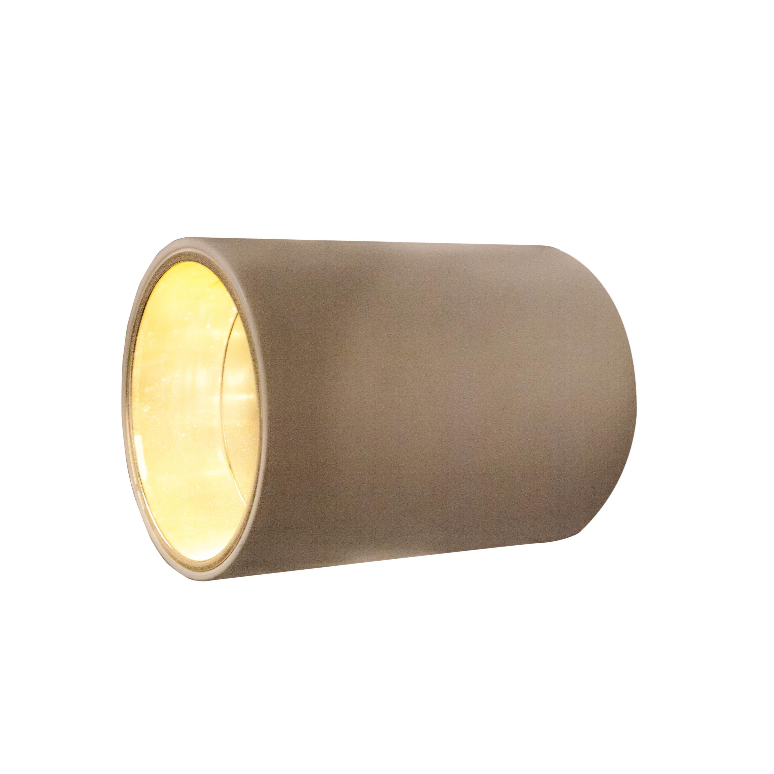 Eight cylindrical sconces / wall lamps whit copper structure. Inside finished in gold and steel.