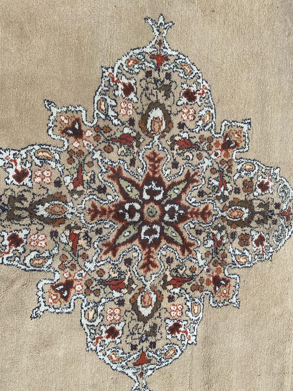 Beautiful vintage Moroccan rug with a central medallion design and light colors with yellow, green, orange, purple and brown, entirely hand knotted with wool velvet on wool foundation.

✨✨✨
