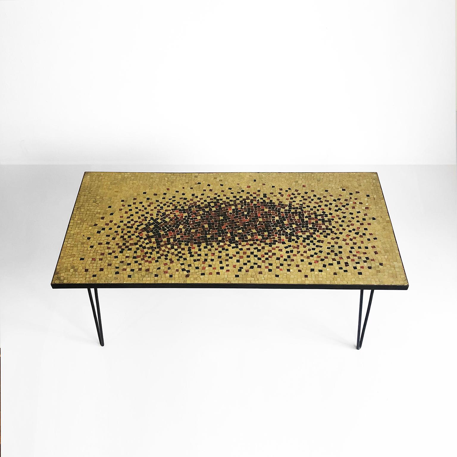 We offer this fantastic midcentury mosaic coffee table in the style of Genaro Alvarez, made in smalti and semiprecious stones.