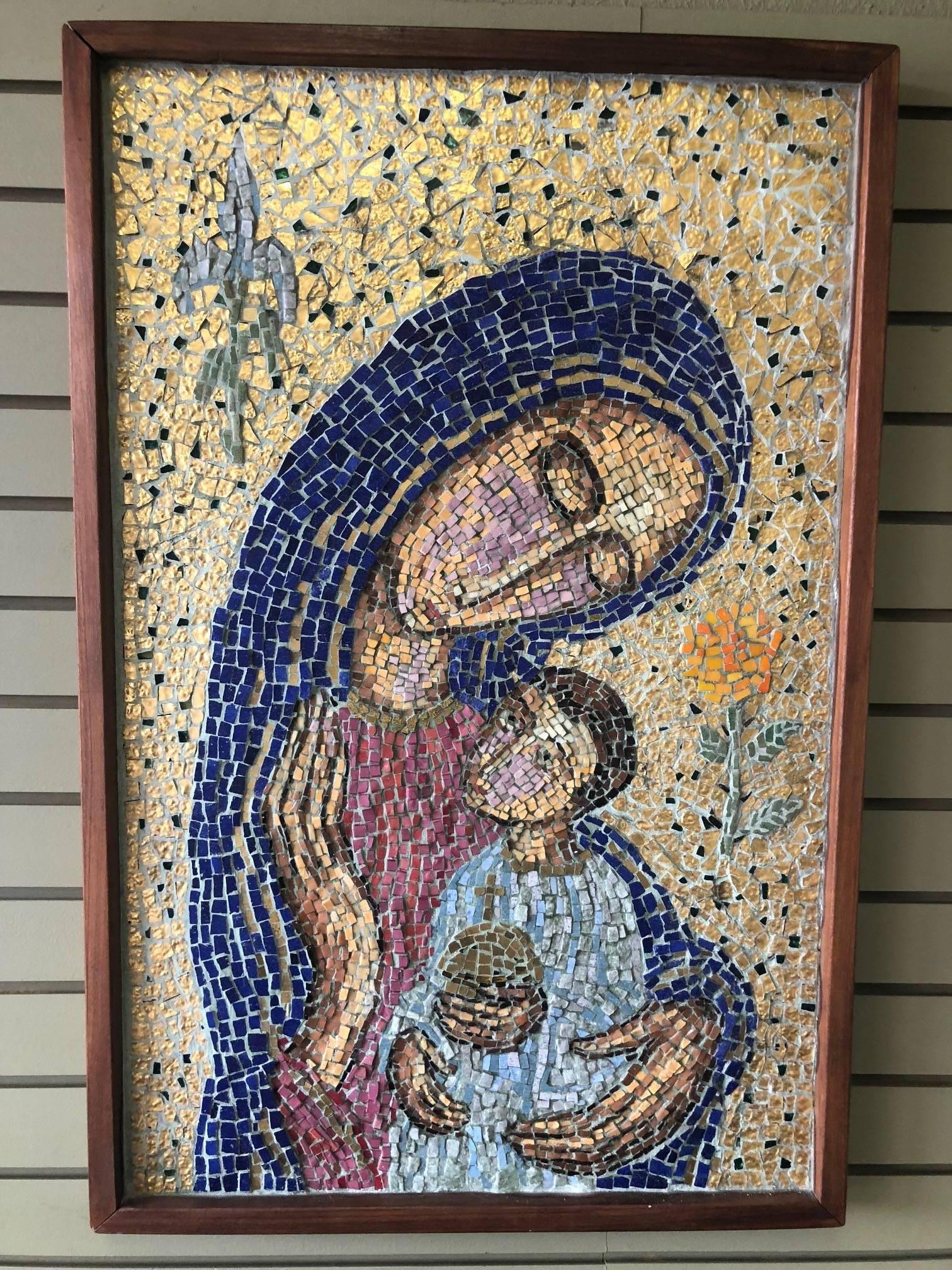 Midcentury mosiac of mother and child by Carmel, CA artist Geza St Galy, circa 1960s. The subject is a modernist representation of baby Jesus and Mary. The piece is framed in deep redwood and is unsigned.

Geza St Galy was born in Hungary in 1902,